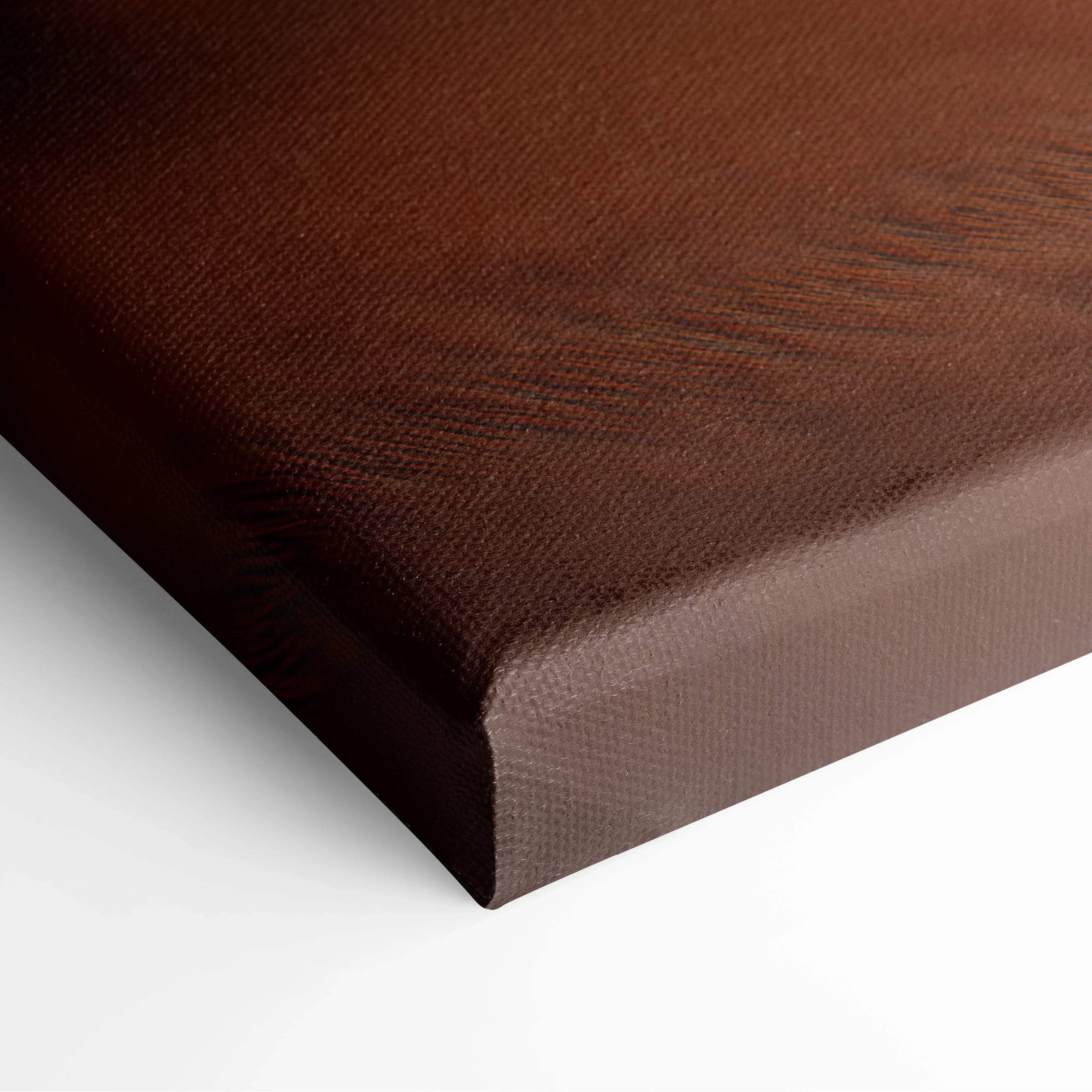 Close-up of brown textured canvas corner with visible fabric weave stretched over wooden frame.