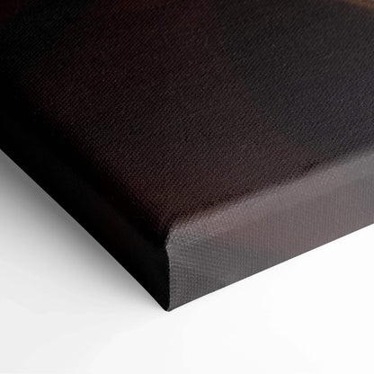 Close-up of black-edged canvas wall art with textured surface and vibrant dark tones.