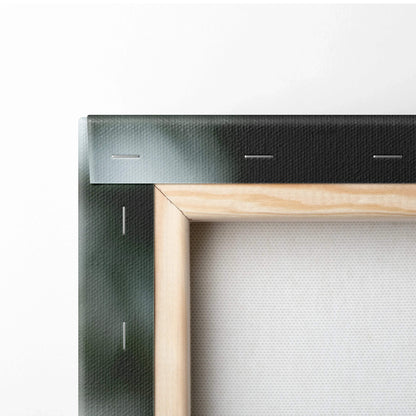 Close-up of wooden frame and stapled white canvas fabric for wall art decor.
