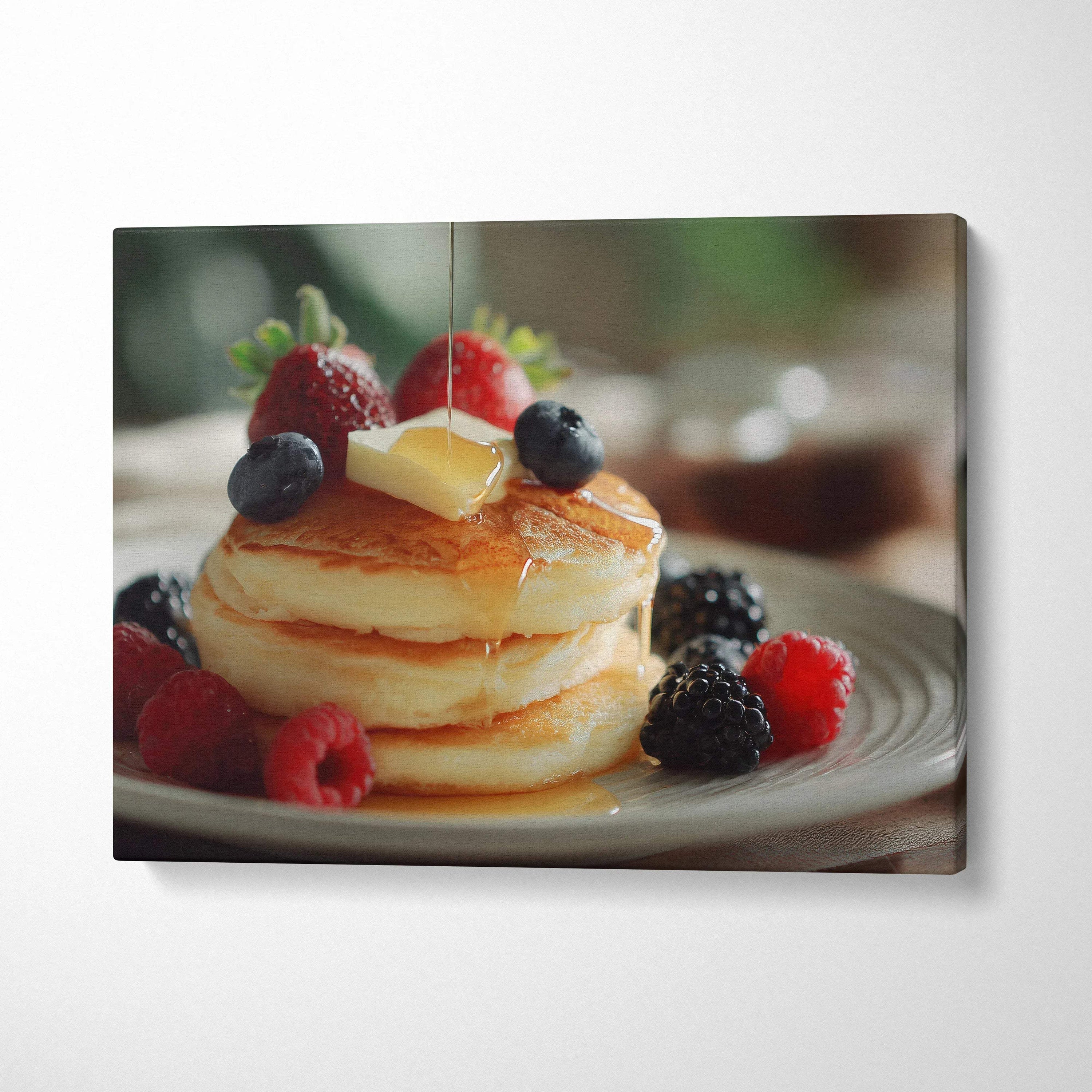 Canvas wall art featuring a stack of pancakes topped with butter and fresh berries, vibrant breakfast decor.