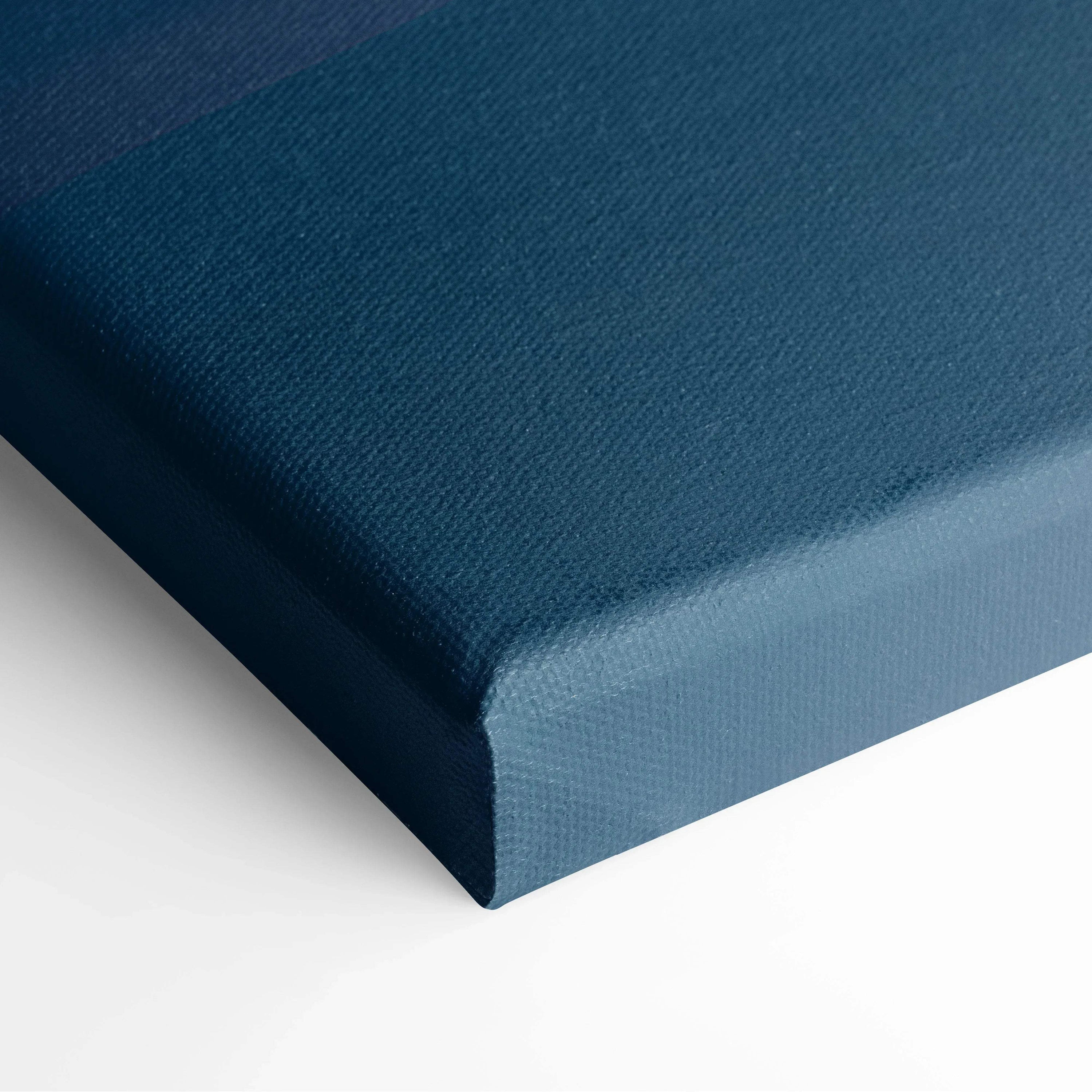 Close-up of blue textured canvas art corner for vibrant abstract wall decor.