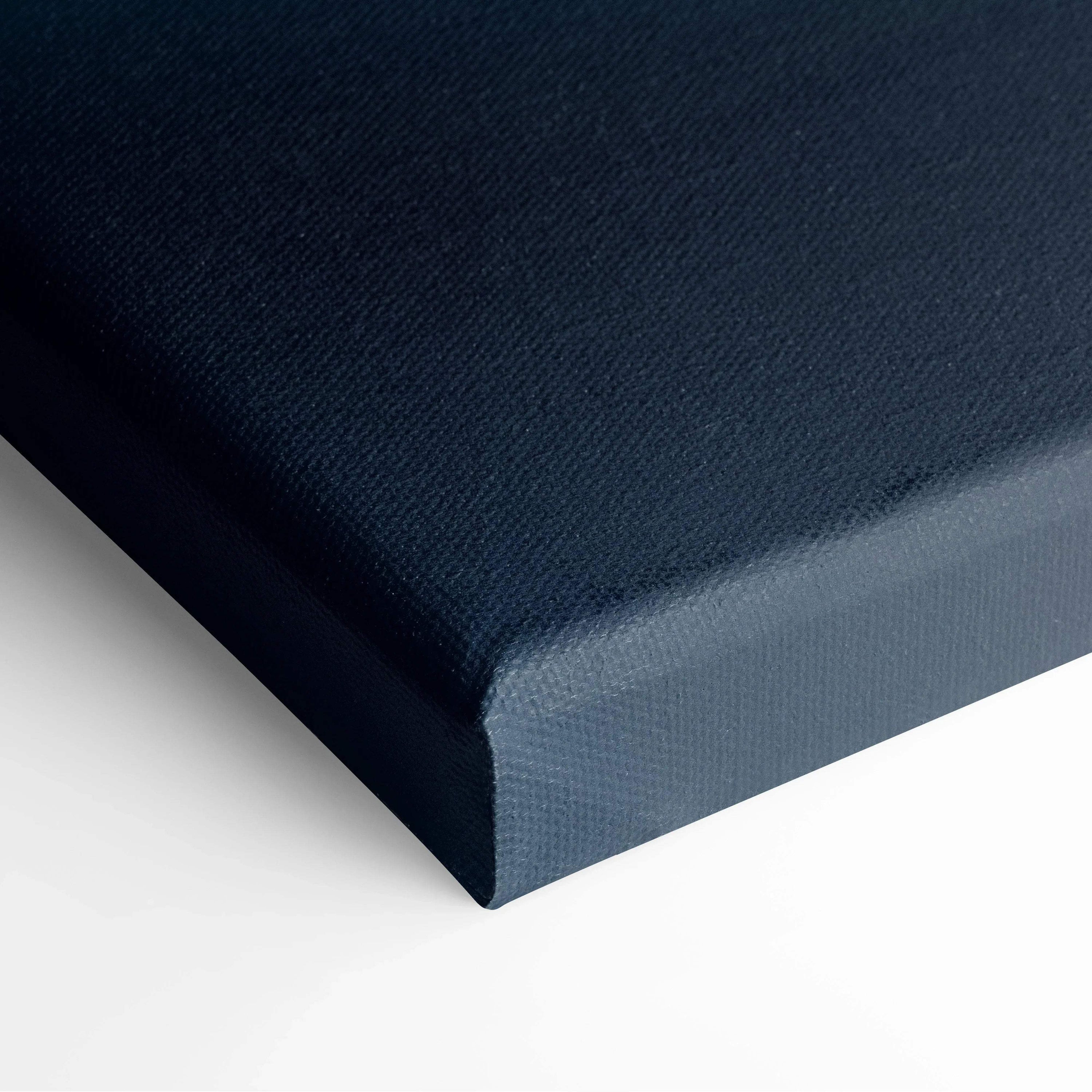 Dark navy blue stretched canvas art with a smooth texture and clean edges.