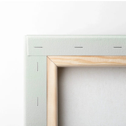 Close-up of wooden frame and white stretched canvas for minimalist canvas wall art.