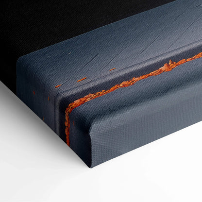 Close-up of dark canvas wall art with textured fabric and burnt orange stitching detail on the edge.