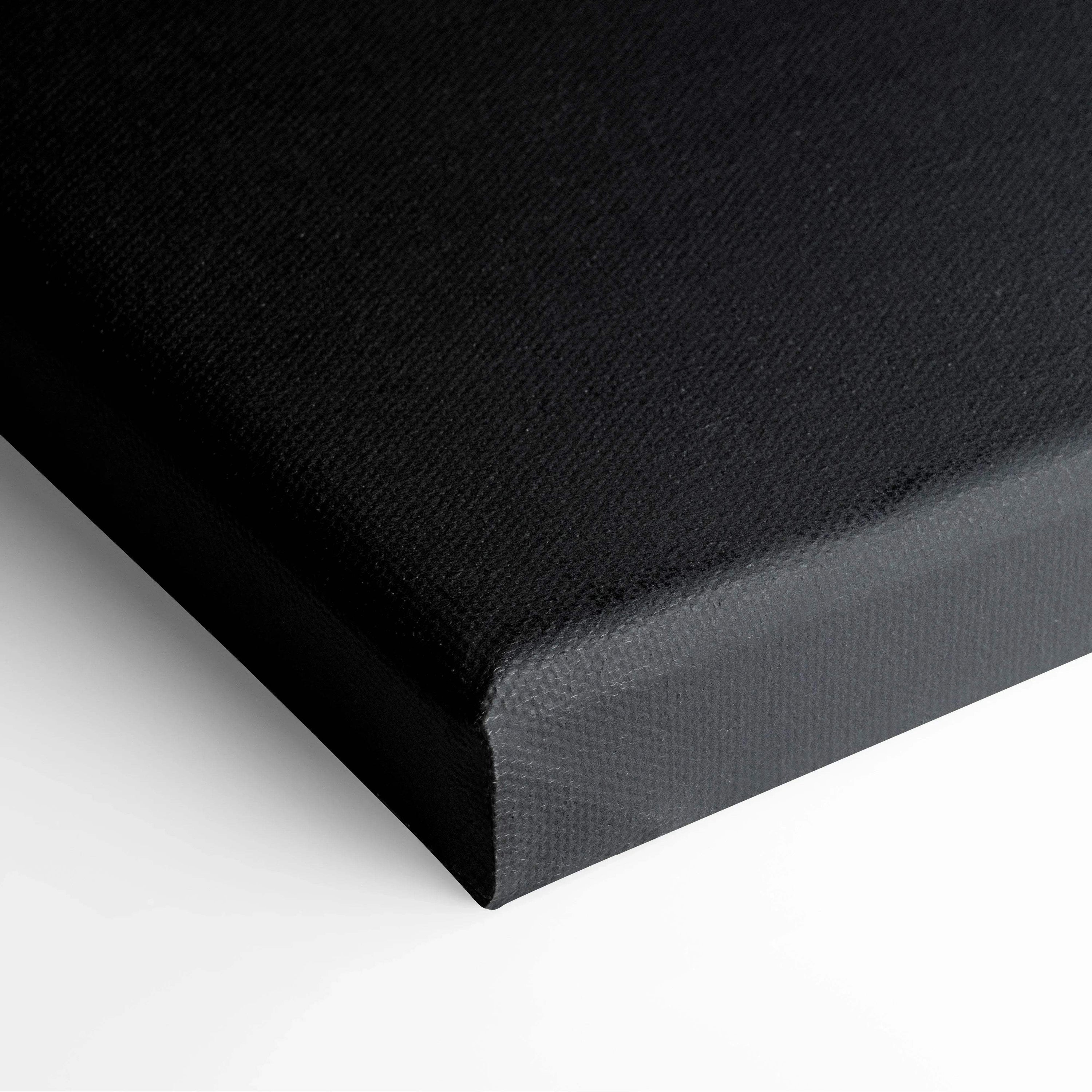 Black textured canvas wrap corner close-up for wall art and canvas art display.