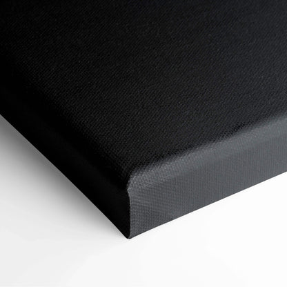 Black minimalist stretched canvas art corner with visible texture and clean edges.