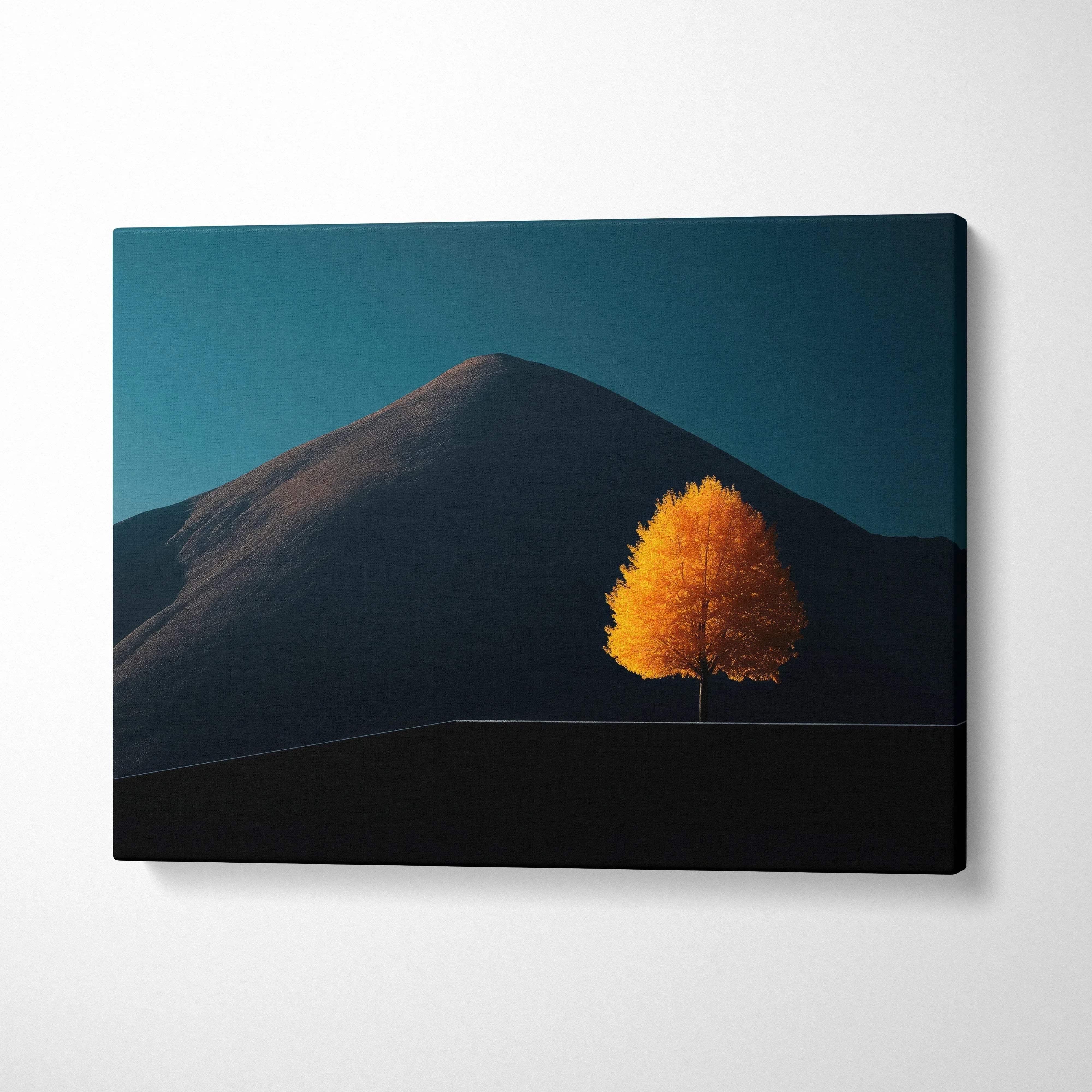 Minimalist canvas art with a single golden autumn tree against dark mountain and teal sky wall art.