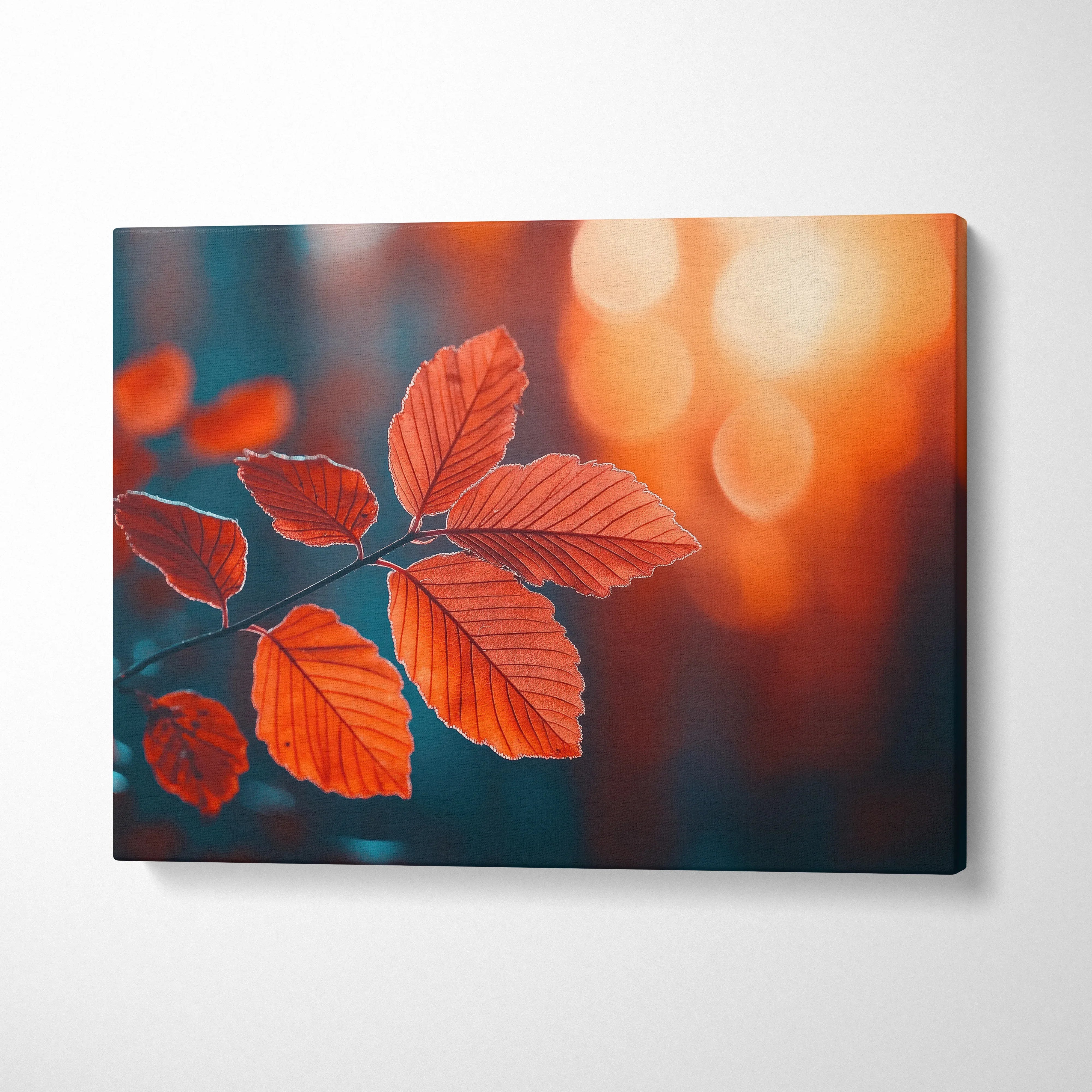 Canvas art featuring minimalist autumn leaves in warm golden and orange tones with blurred background, wall art for nature.