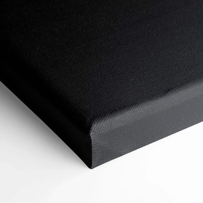 Black stretched canvas corner showcasing texture and clean edges for wall art.