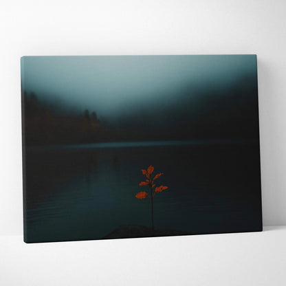 Minimalist autumn canvas art with warm hues showing a single orange leafed branch against dark misty lake wall art.