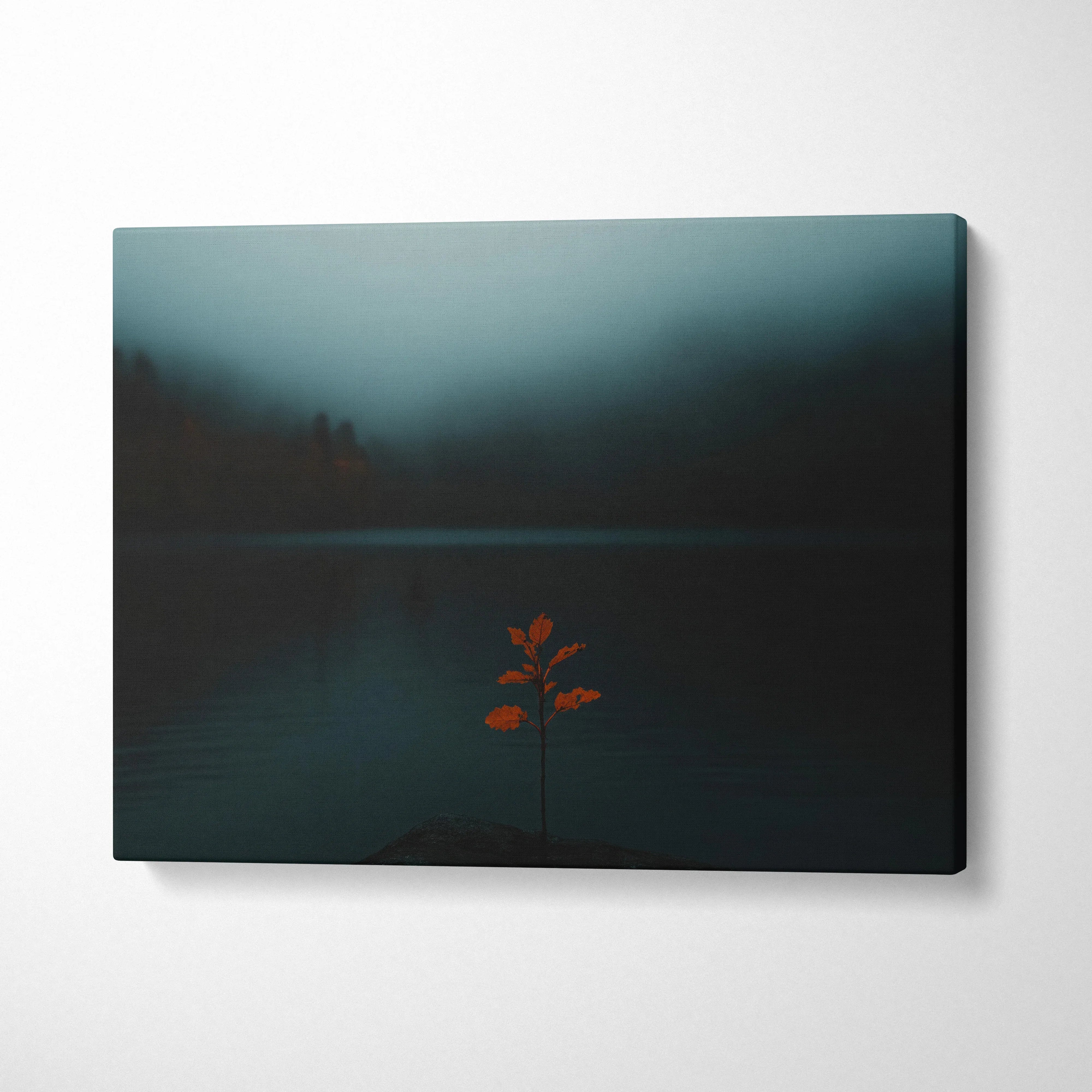 Minimalist autumn nature canvas art with warm hues and a single orange leaf on dark lake wall art.