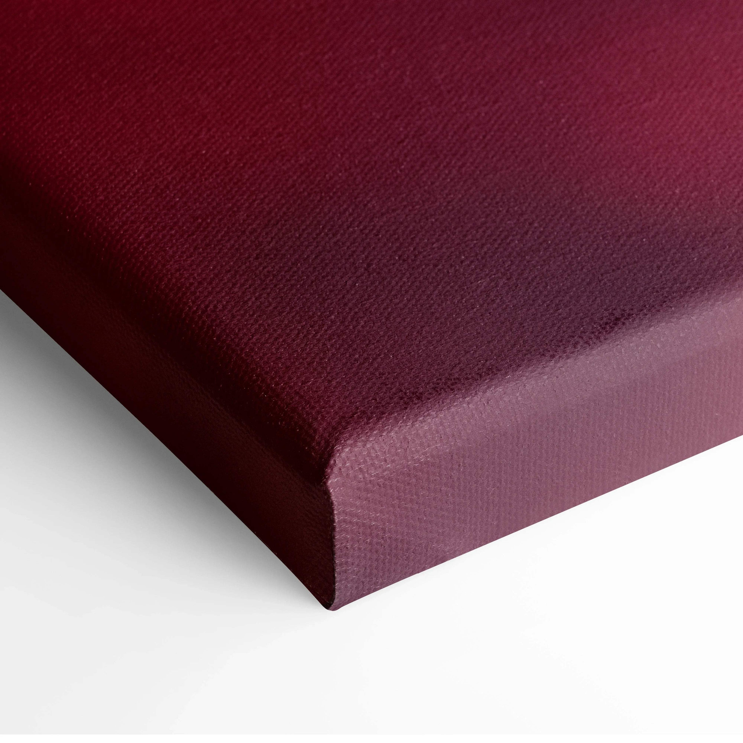 Deep burgundy minimalist canvas wall art with subtle textured surface, framed edge detail.