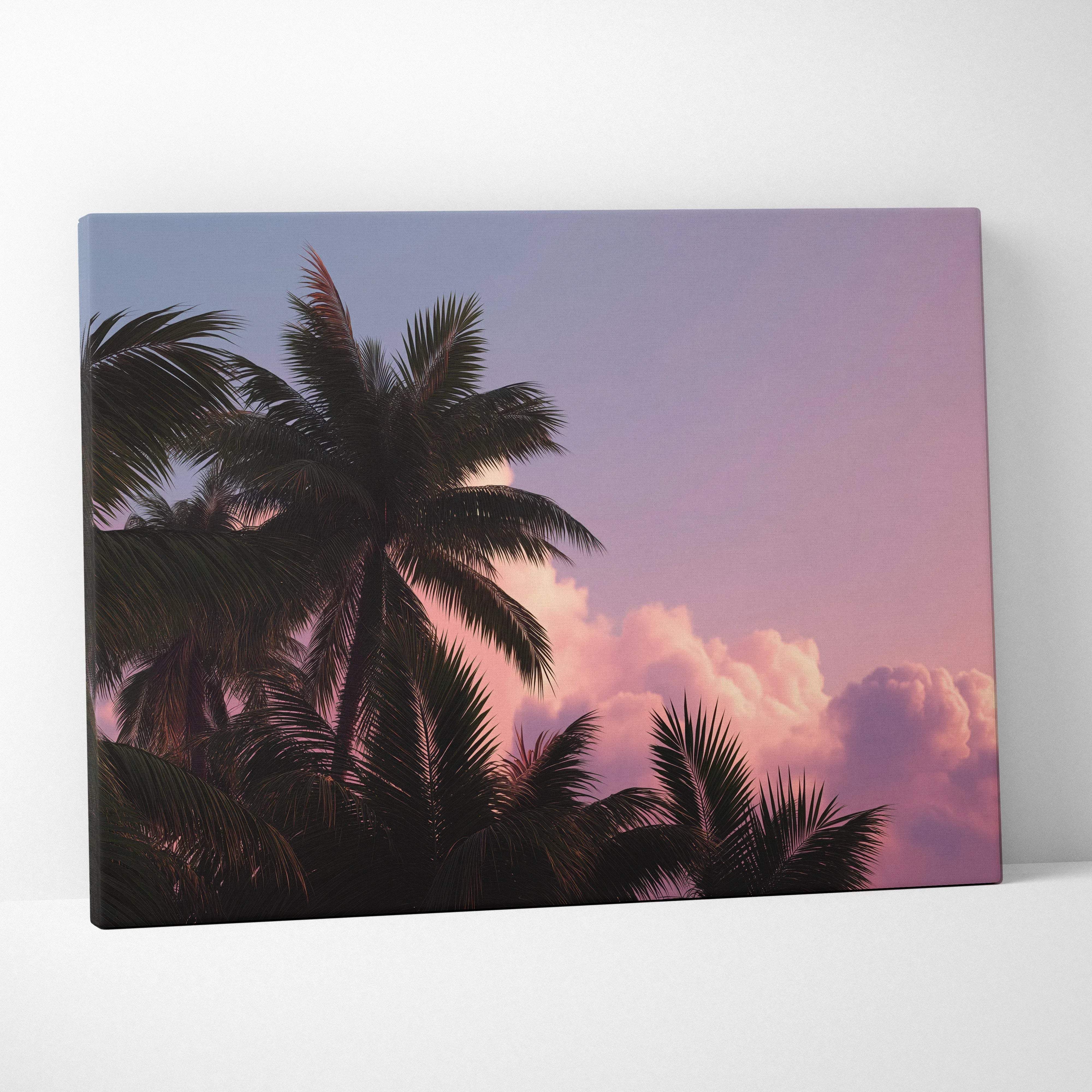 Rectangular canvas print of silhouetted palm trees against a pink and purple sunset for calm tropical ambience
