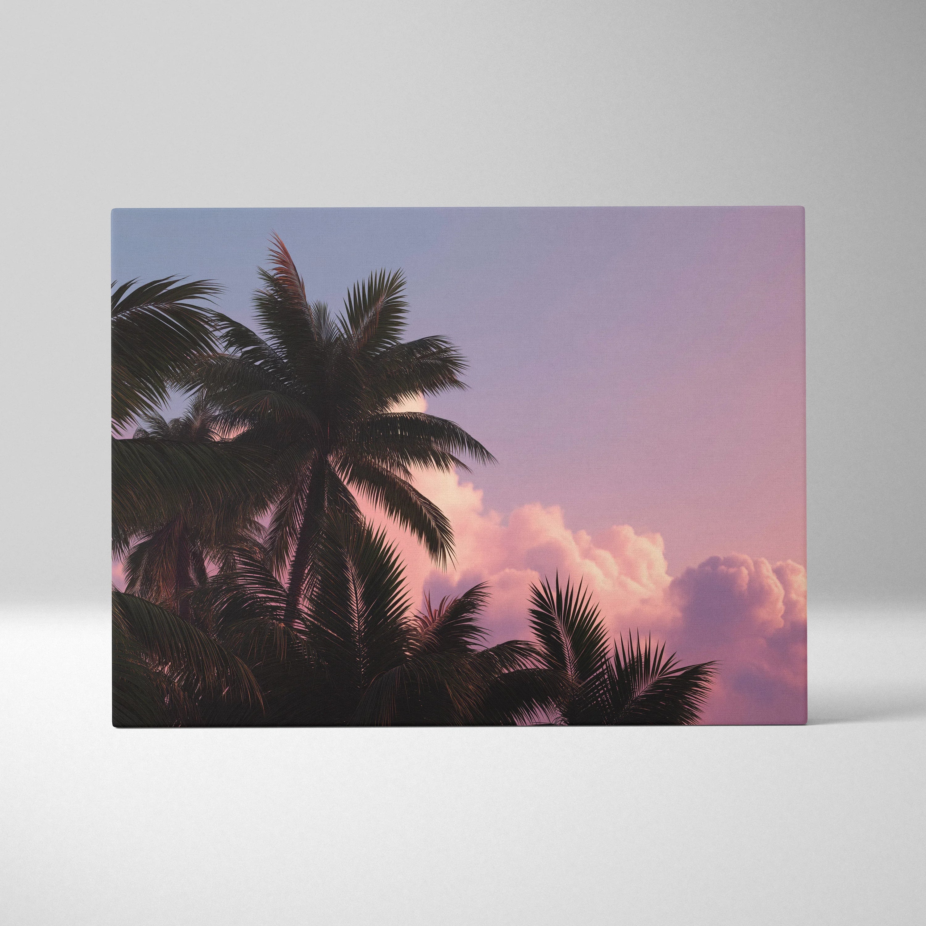 Canvas wall art featuring dark palm tree silhouettes against a pink and purple sunset sky.