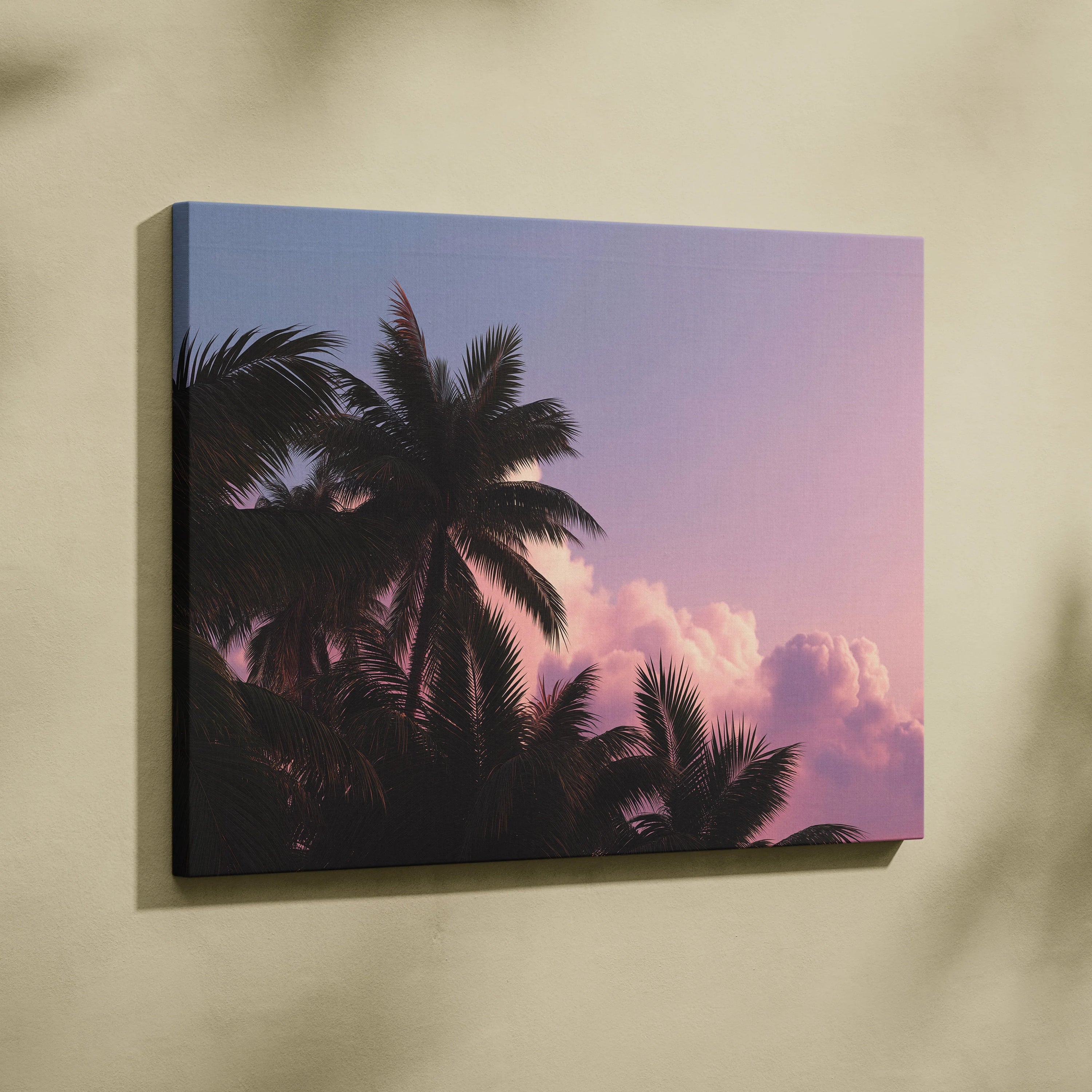 Canvas wall art featuring tropical palm trees silhouetted against a pink and purple sunset sky.
