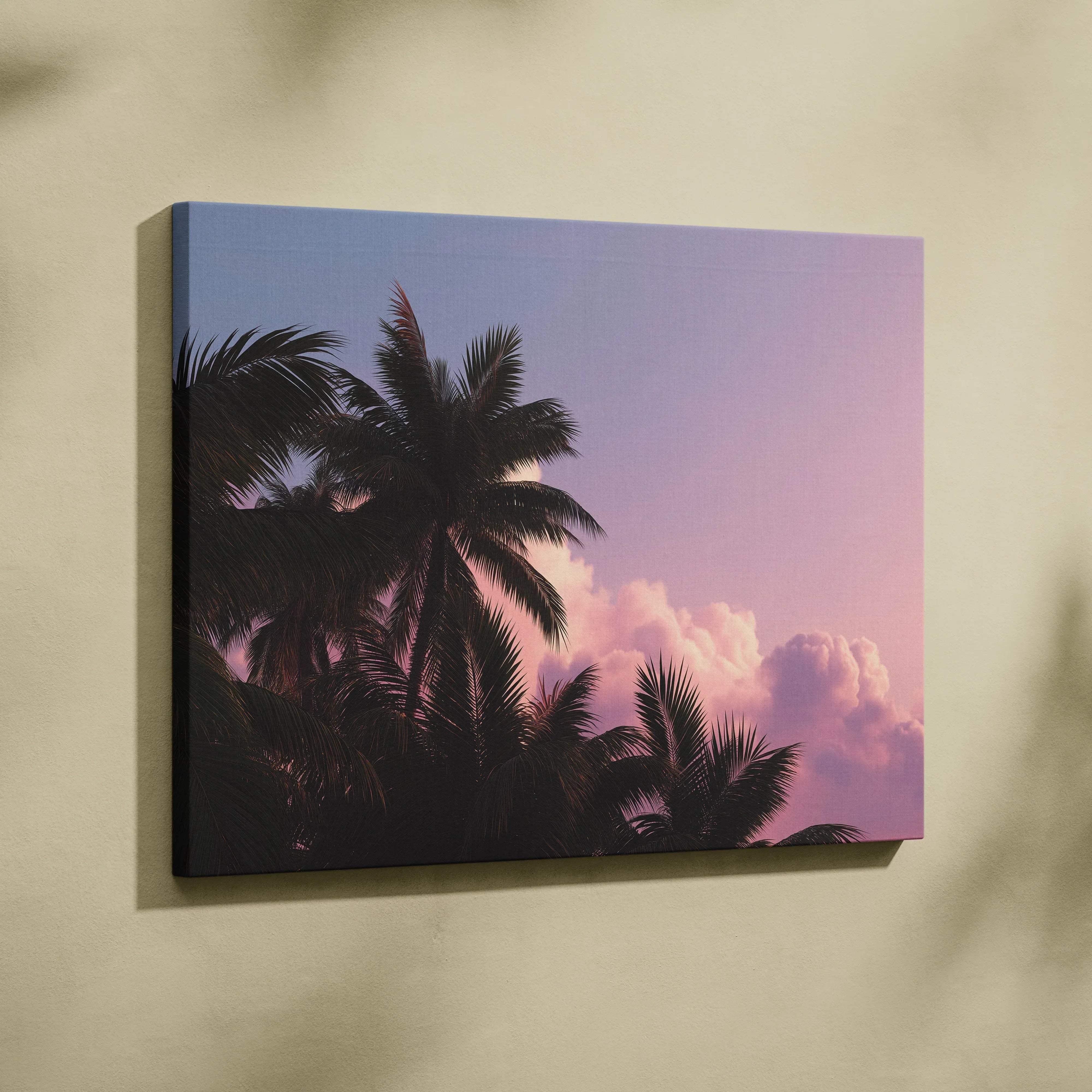 A rectangular canvas print of silhouetted palm trees against a soft pink and purple twilight sky for calm tropical ambience