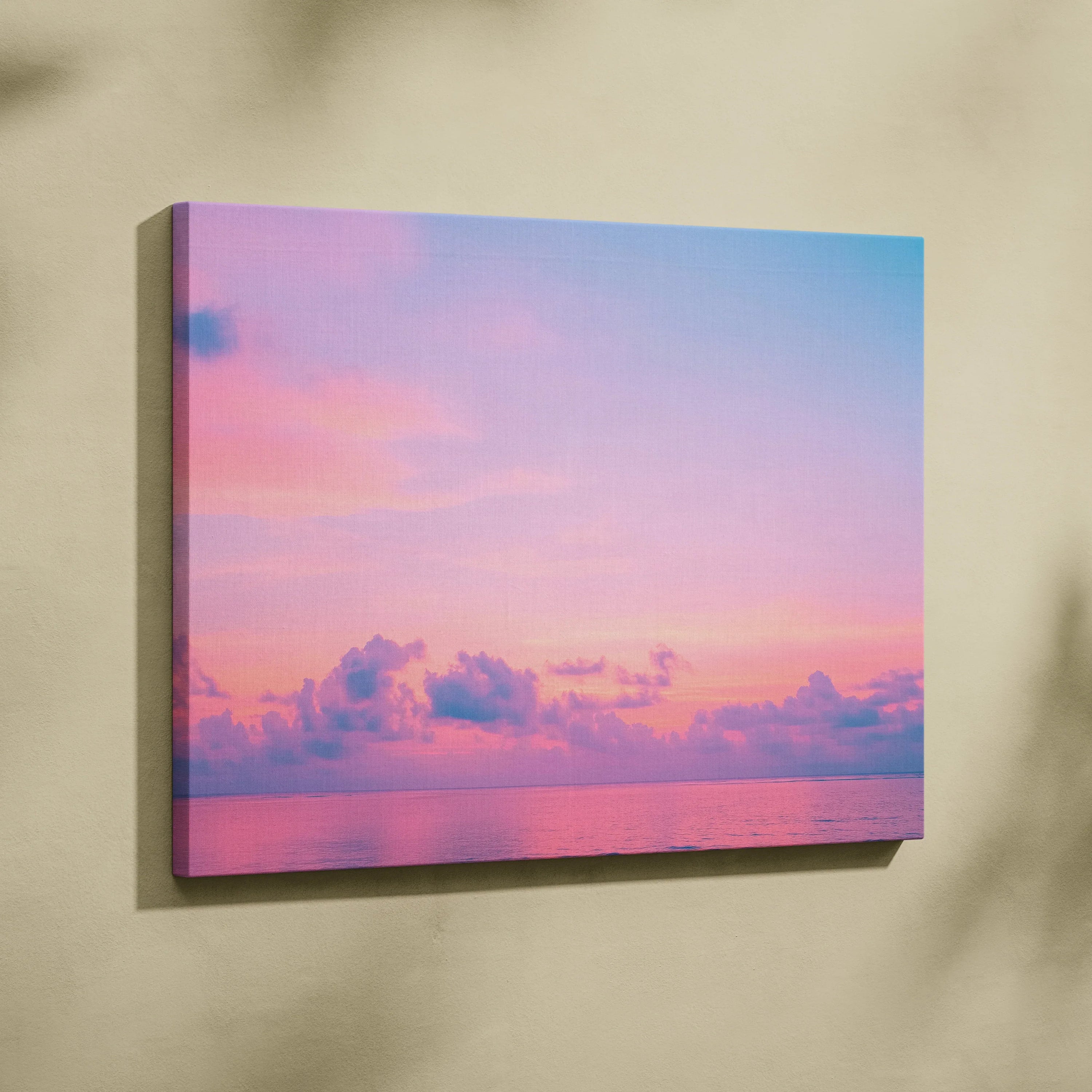 Tropical sunset canvas wall art with pink and purple clouds over calm ocean decor.