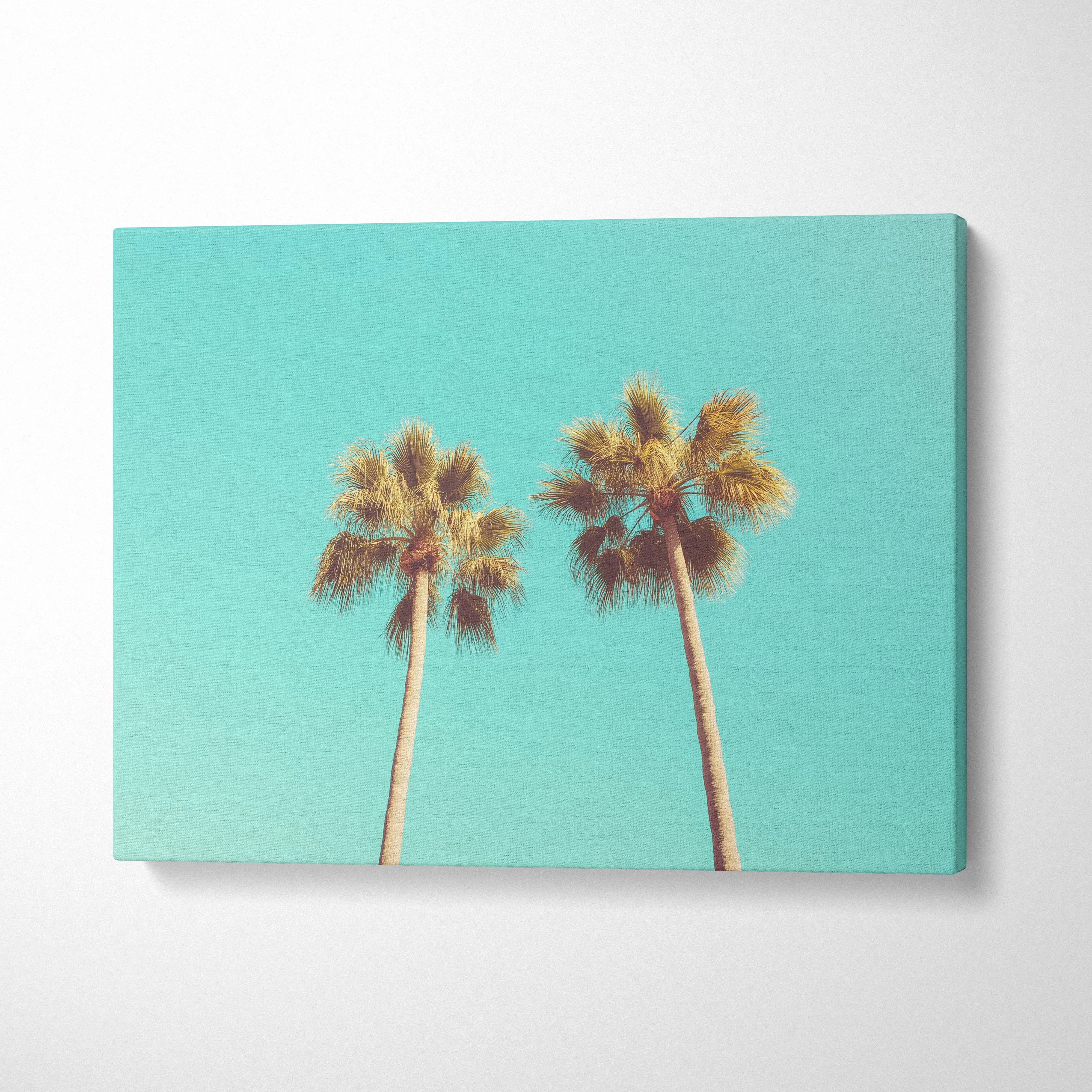 Tropical palm trees canvas wall art with turquoise sky background, modern decor piece.