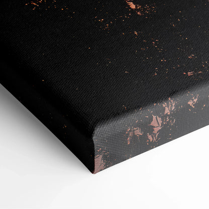 Black canvas wall art with subtle copper splatter detailing on textured fabric edges.