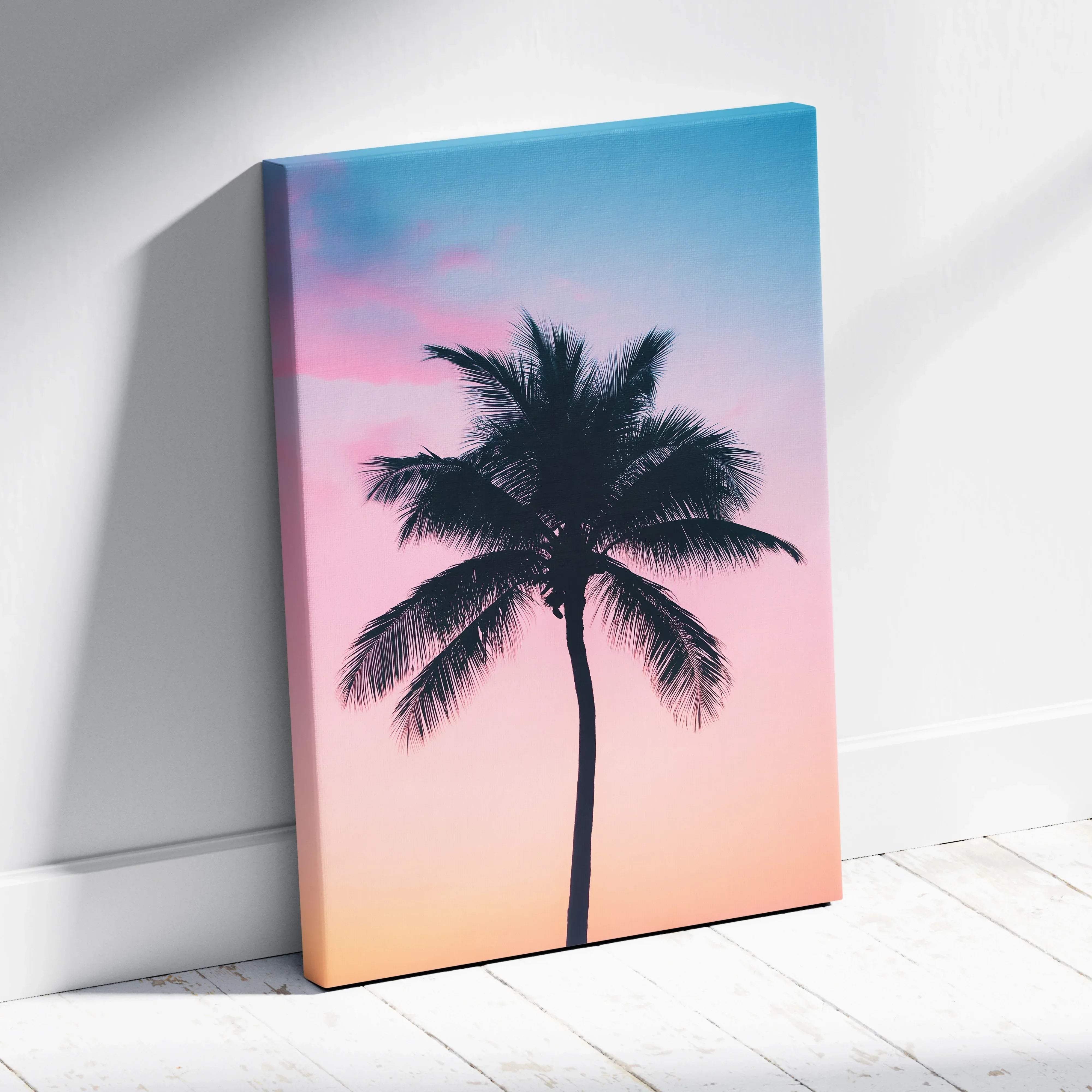 Pastel sunset palm tree silhouette canvas wall art with black palm tree on pink peach to blue gradient sky background