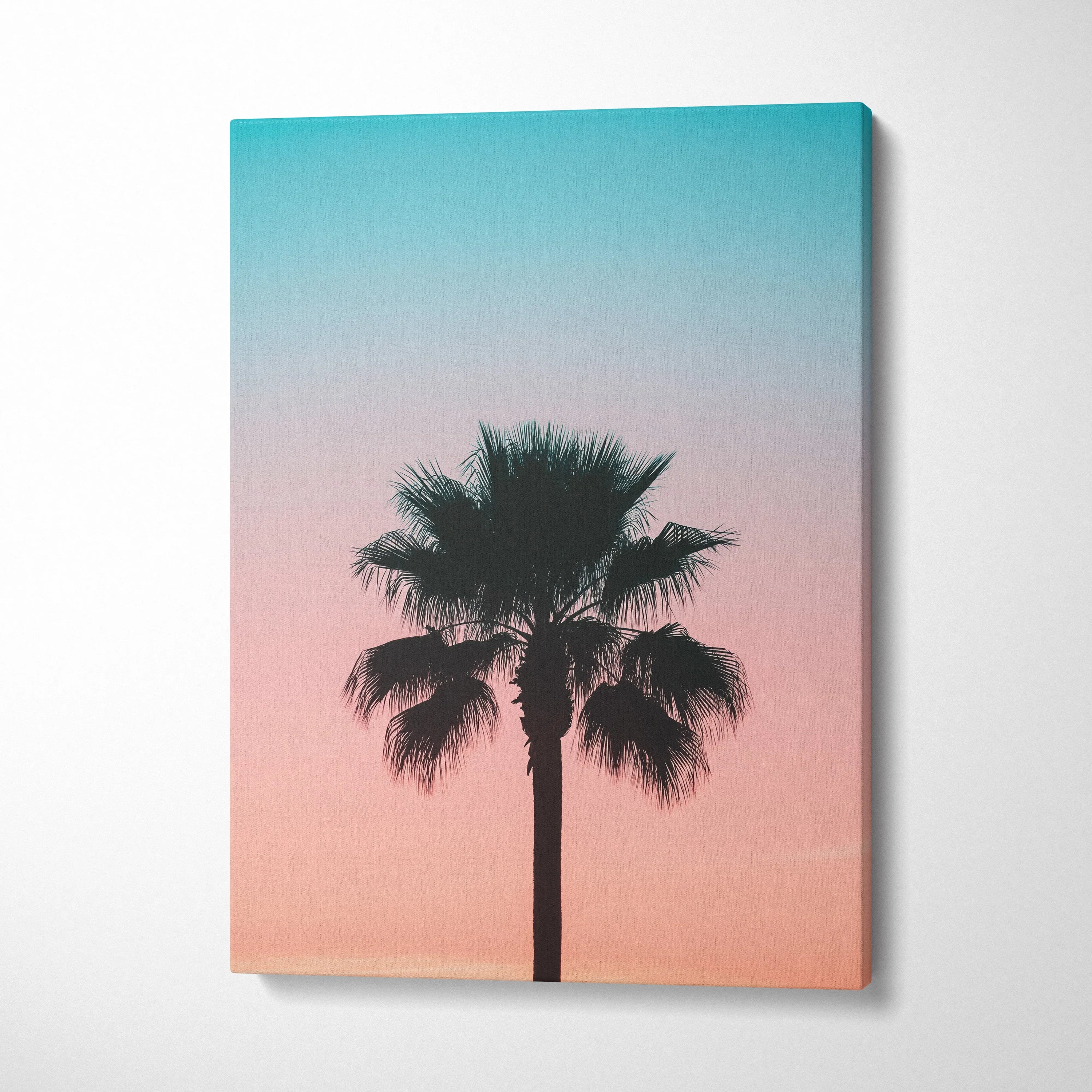 Palm tree silhouette against pink and blue sunset sky canvas wall art decor.