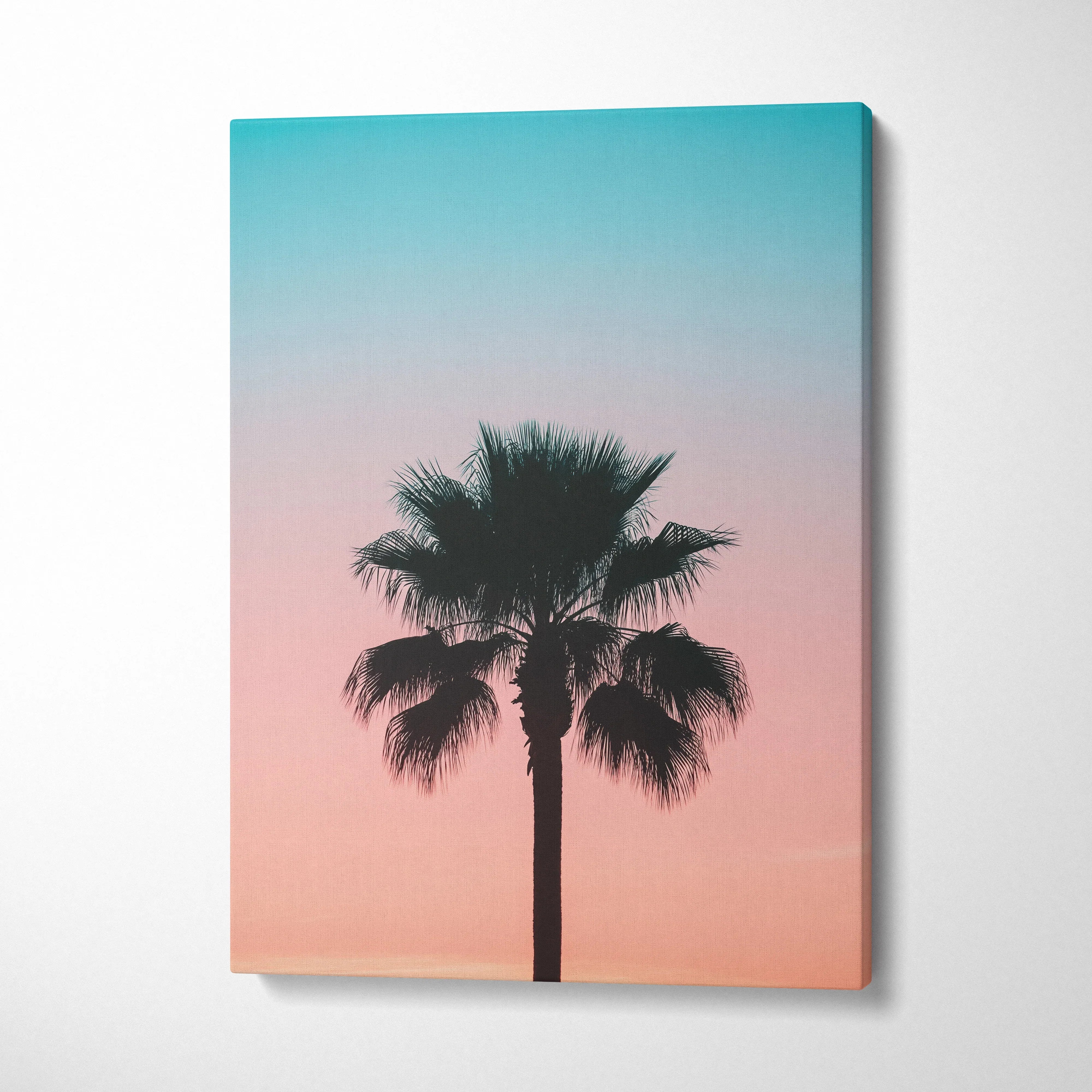 Palm tree silhouette against pink and blue sunset sky canvas wall art decor.
