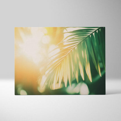 Canvas wall art featuring digital tropical palm leaves bathed in warm golden sunlight with soft blurred background.