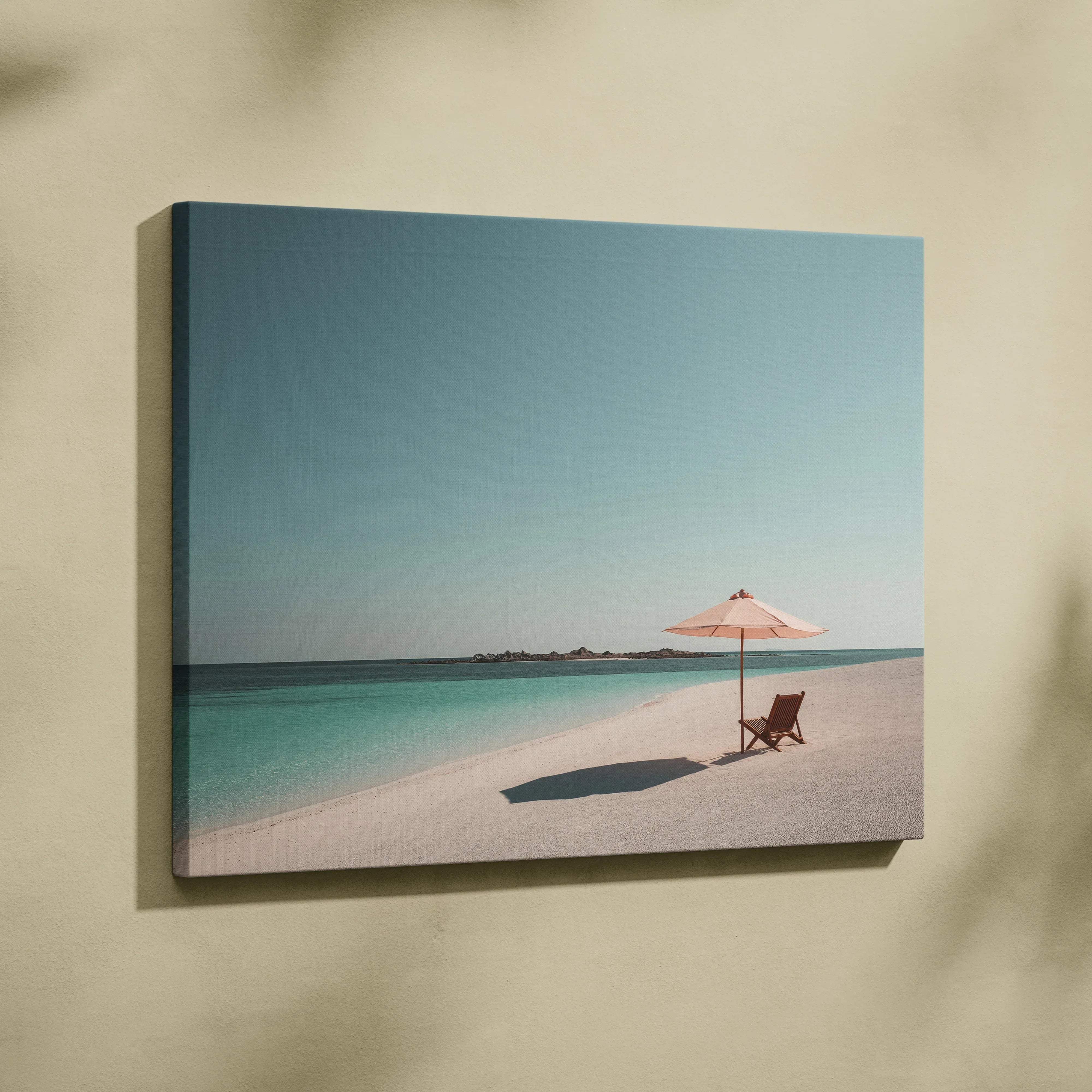 Beige canvas print of a turquoise water beach scene with white sand pink umbrella and wooden chair for wall art