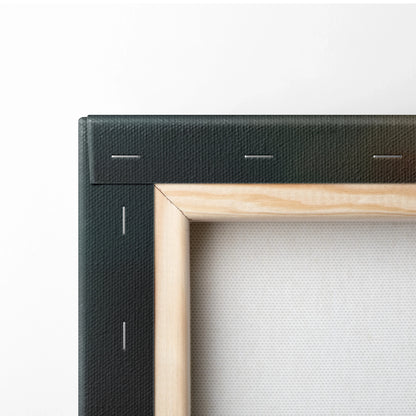 Close-up of wooden stretcher frame with black canvas wrapped and stapled on the back for wall art decor.