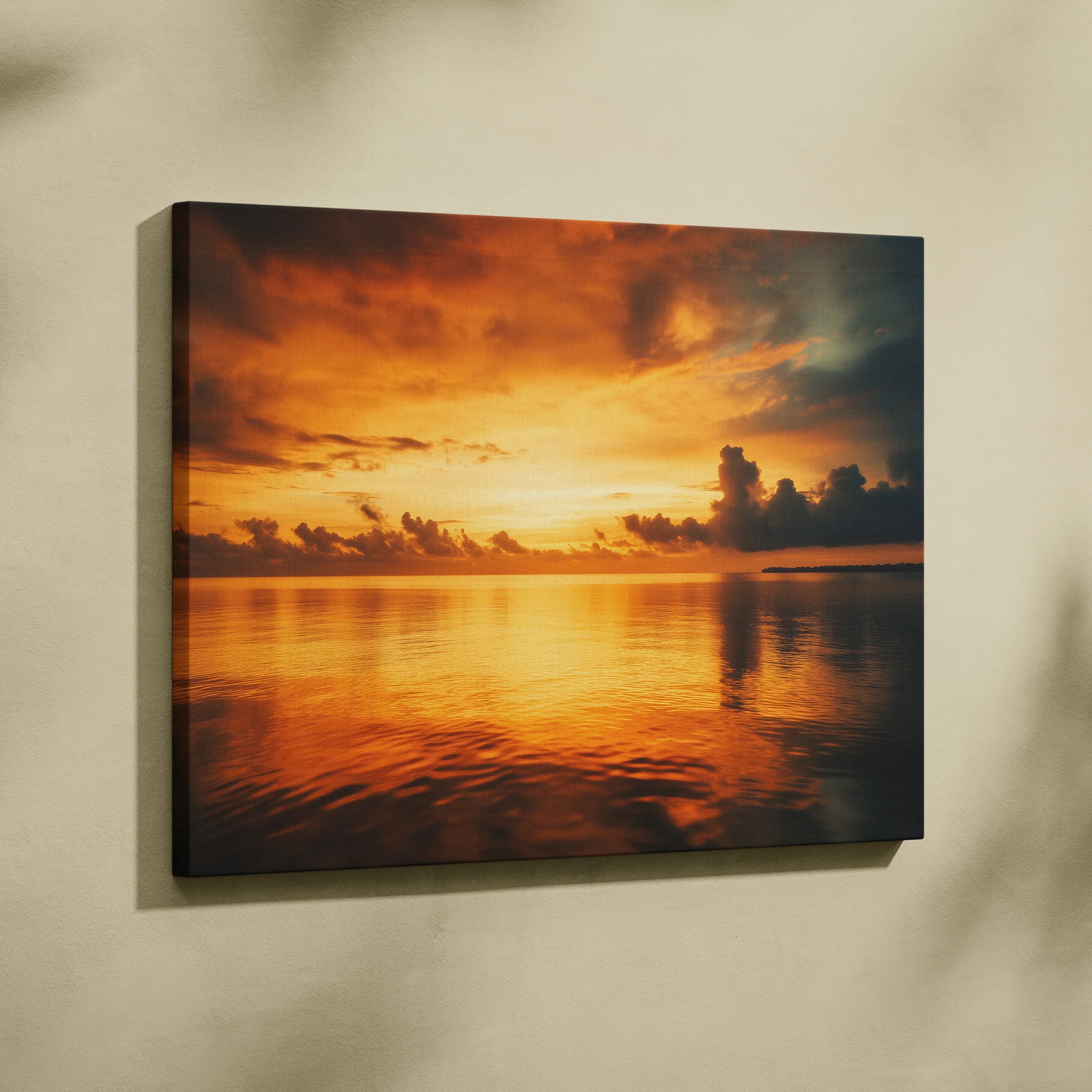 Canvas wall art depicting a vibrant orange and yellow sunset with clouds over calm ocean water.