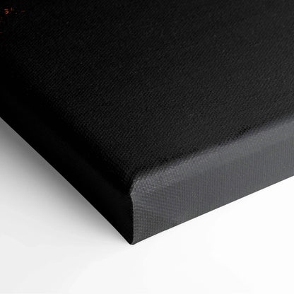 Black canvas wrap with a smooth texture and tightly stretched edges for wall art decor.
