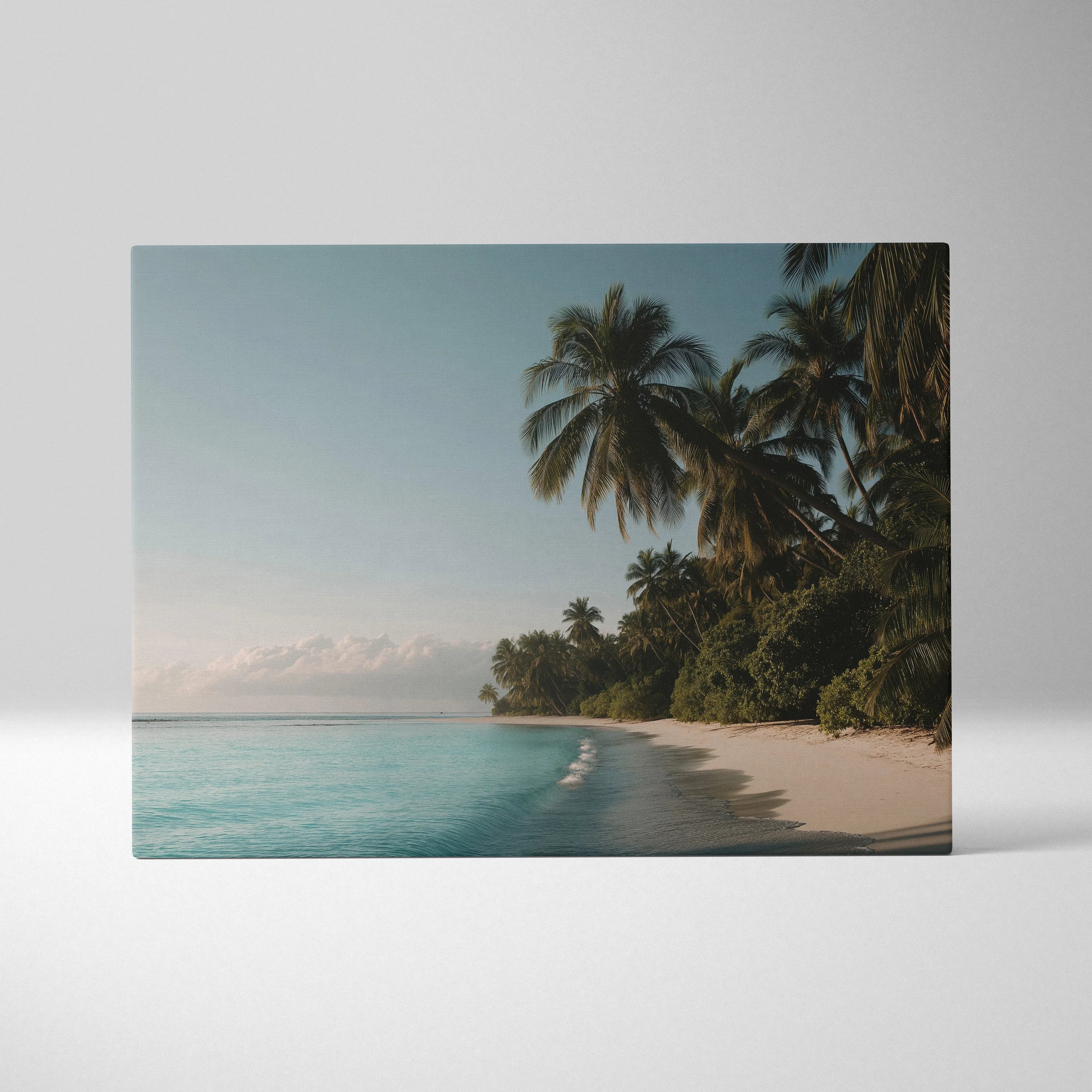 Canvas wall art of a tropical beach with turquoise water, white sandy shore, and tall palm trees under a clear sky.