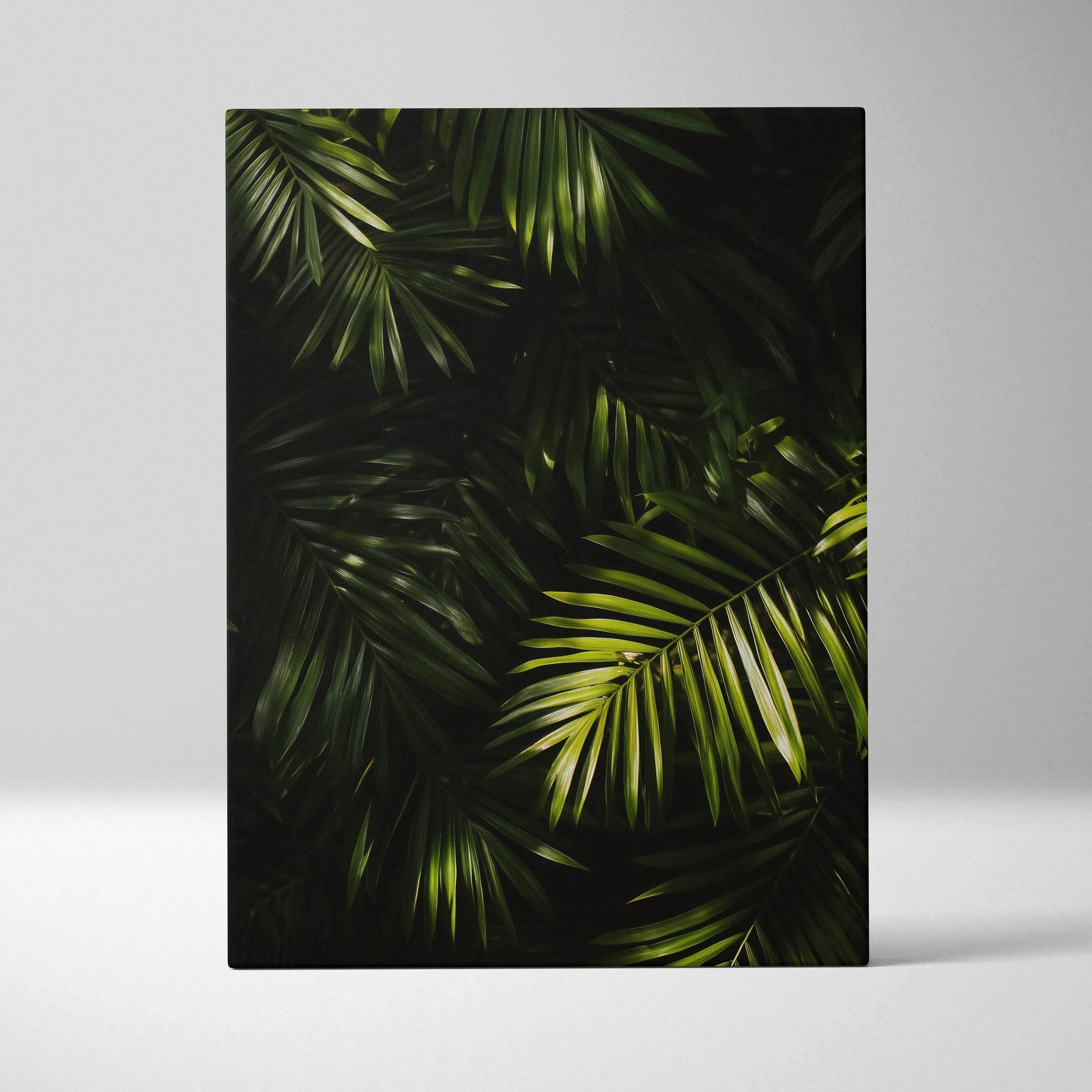 Rectangular premium canvas wall art featuring lush green tropical palm leaves with illuminated highlights for home decor
