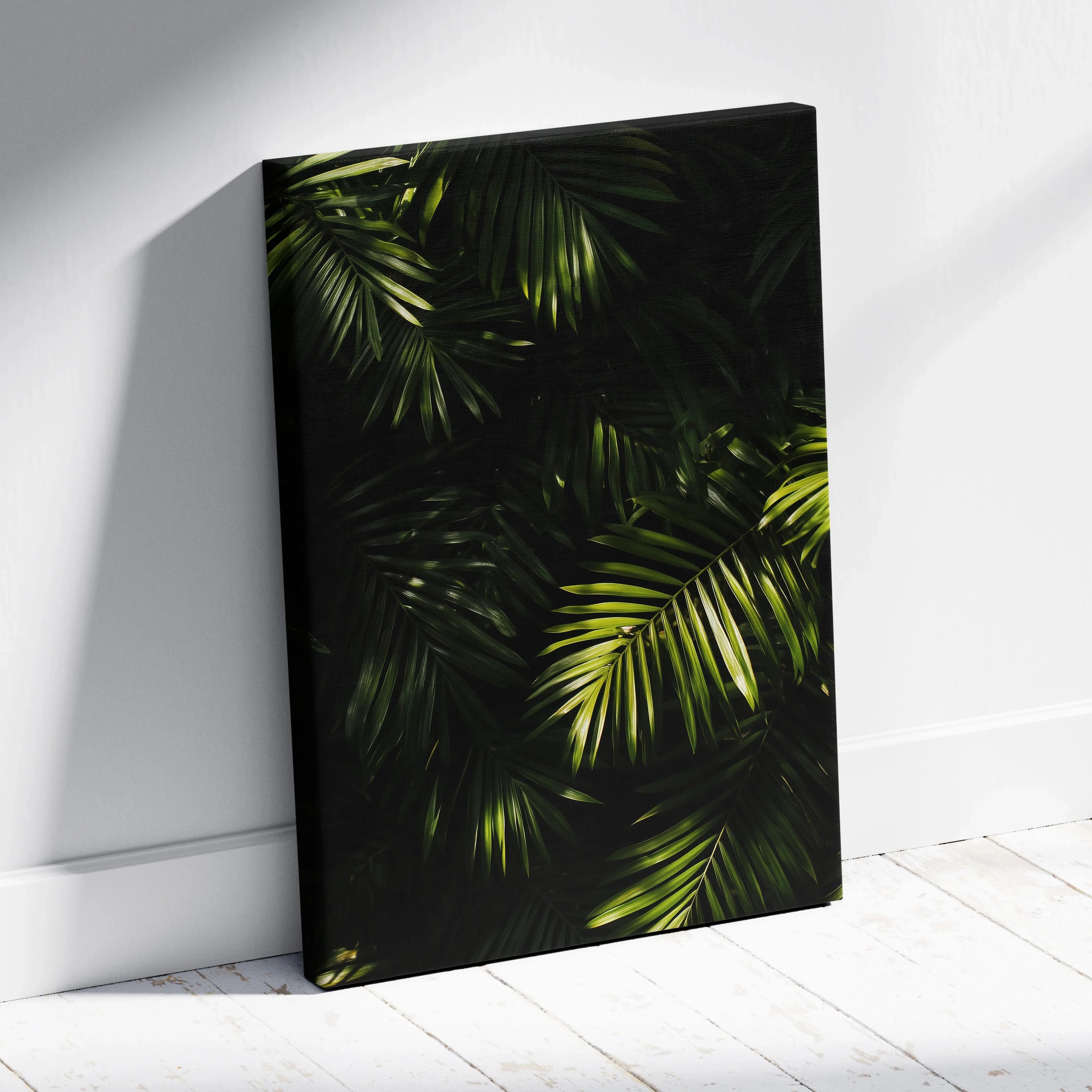 Canvas wall art featuring lush green tropical palm leaves against a deep black background.
