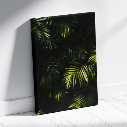 Canvas wall art featuring lush green tropical palm leaves against a deep black background.