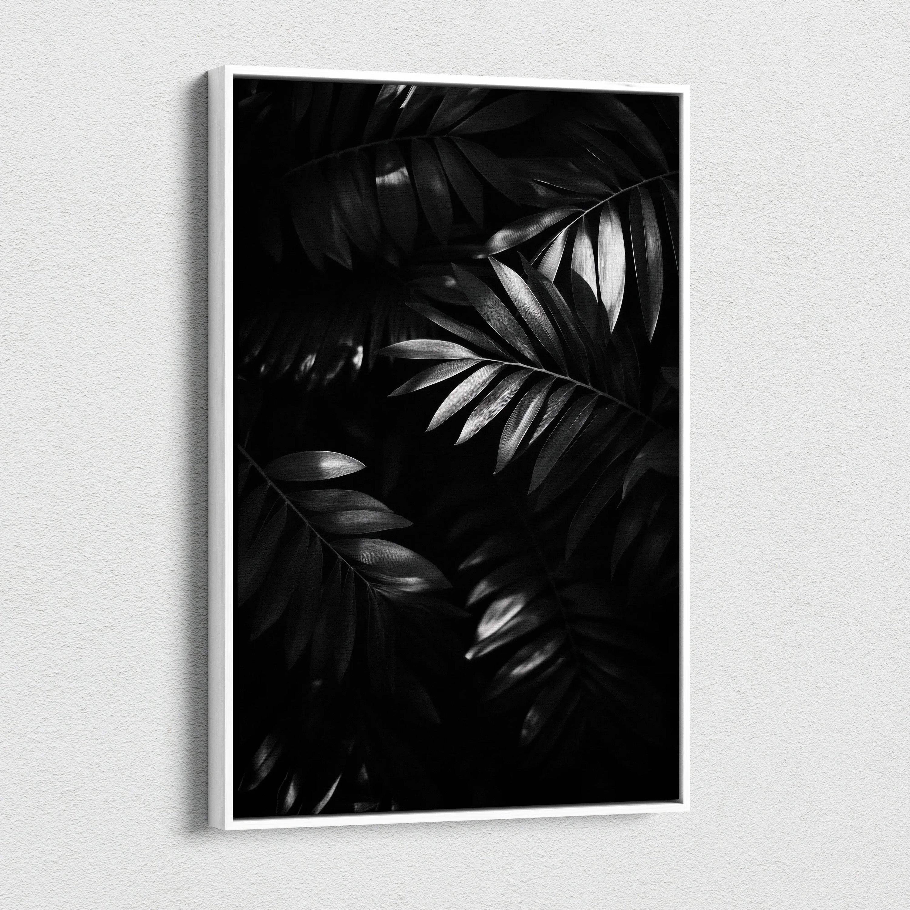 Monochrome black and white digital canvas art featuring layered tropical leaves with a sleek modern frame.