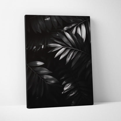 Monochrome digital canvas art print featuring detailed tropical leaves in black and gray tones for modern wall decor.