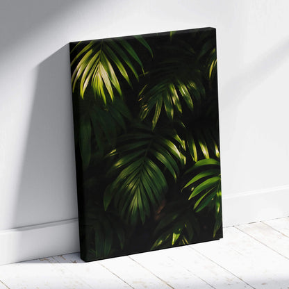 Canvas wall art featuring lush tropical green leaves on a dark background with museum-quality finish.