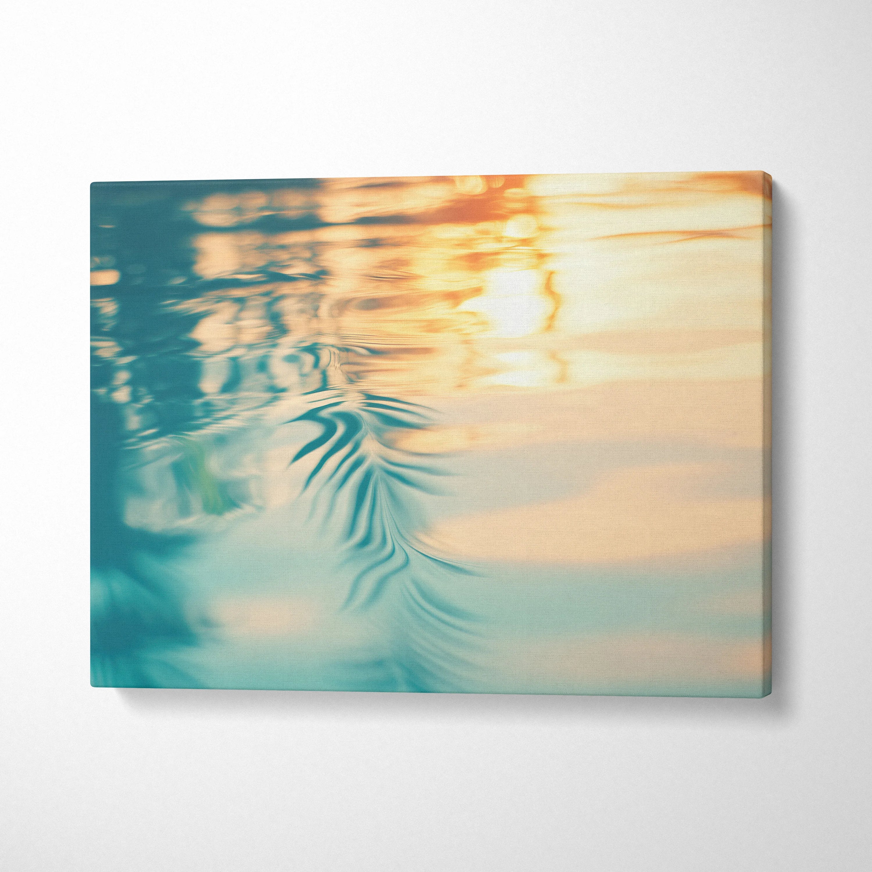 Tropical sunset water reflection digital art on canvas wall decor with soft blue and orange hues.