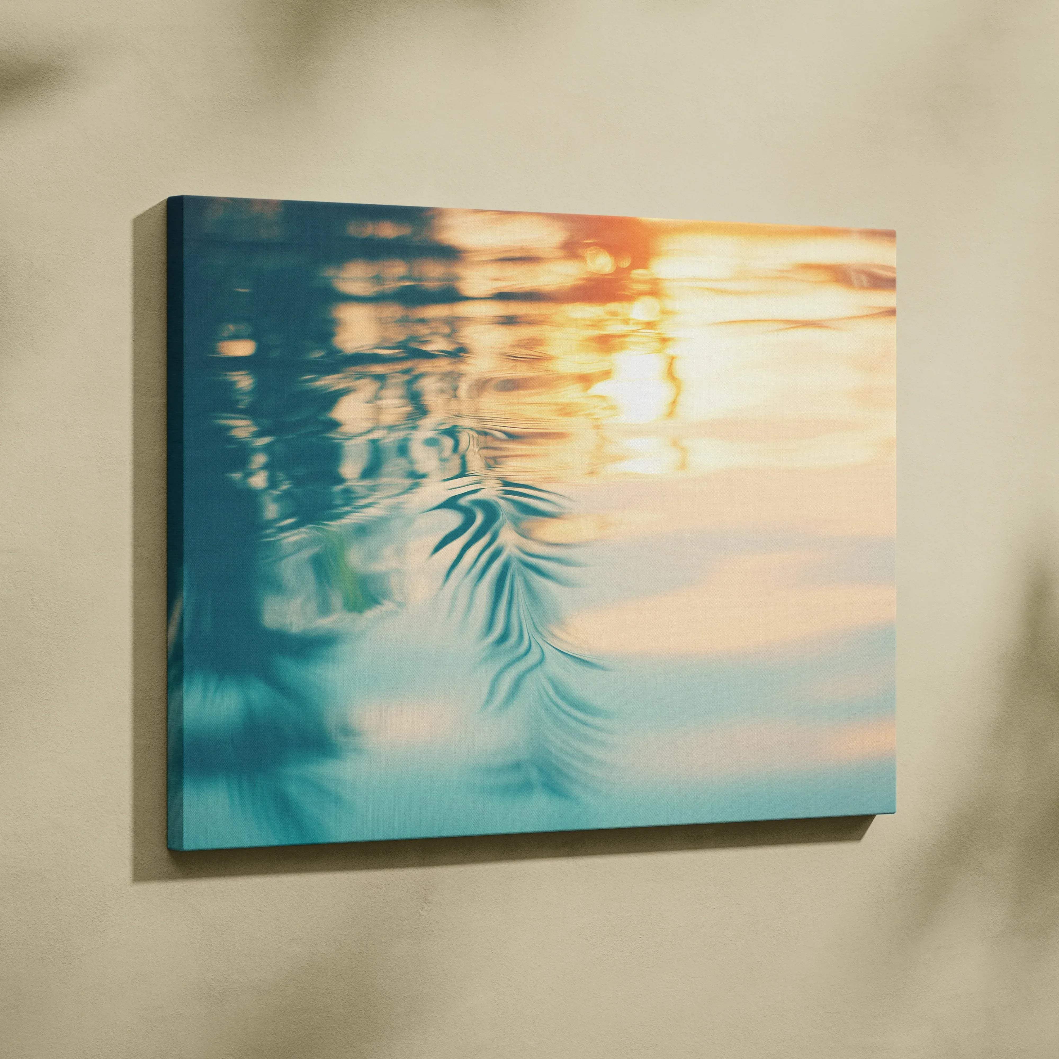 A square canvas print of tropical sunset water reflection with golden and teal hues and palm frond silhouettes