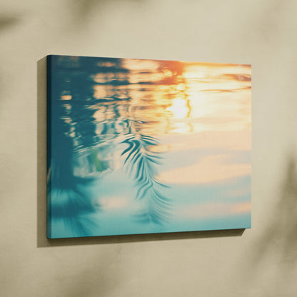 Canvas wall art featuring a tropical sunset reflected softly on rippling water in warm blue and orange tones.