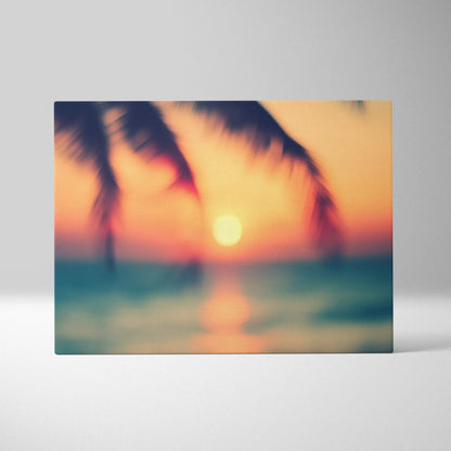 Canvas wall art depicting a blurred tropical sunset with palm tree silhouettes and glowing ocean colors.