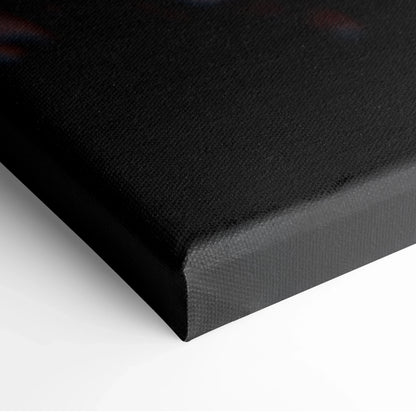 Close-up of black canvas wrap with textured fabric and sharp corner edges for wall art.