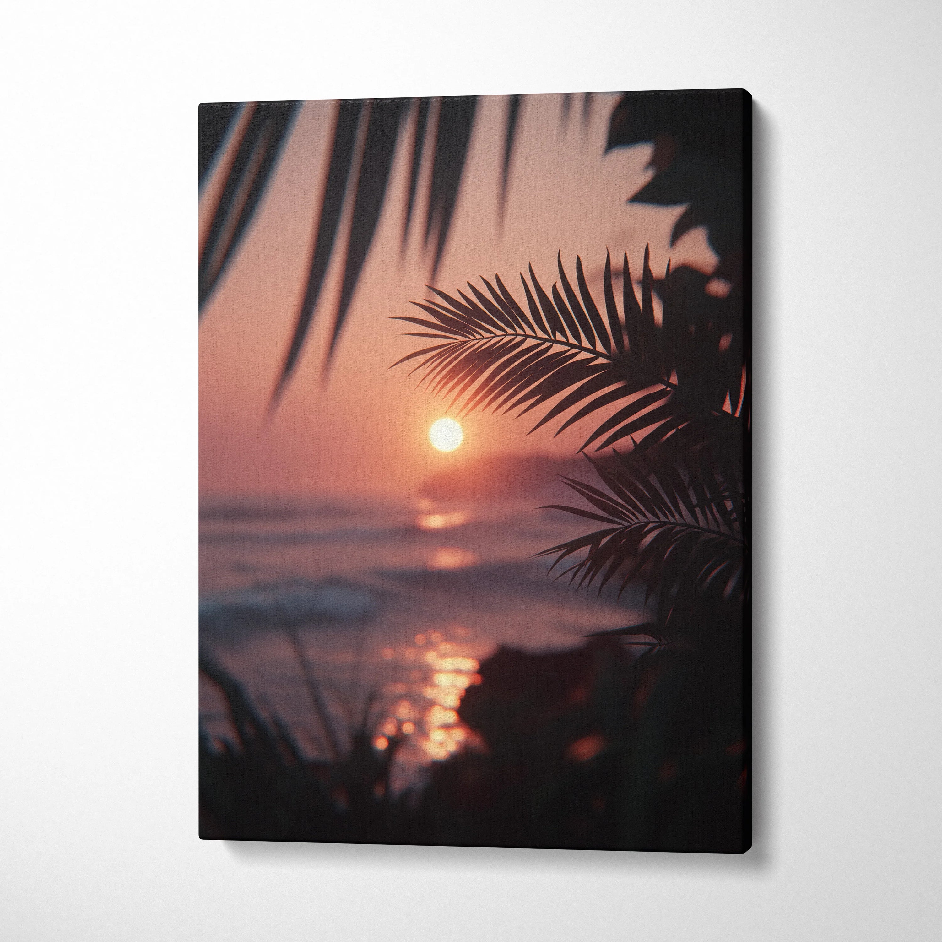 Vertical canvas wall art featuring a tropical sunset with palm leaves silhouetted over ocean waves, warm pink and orange.