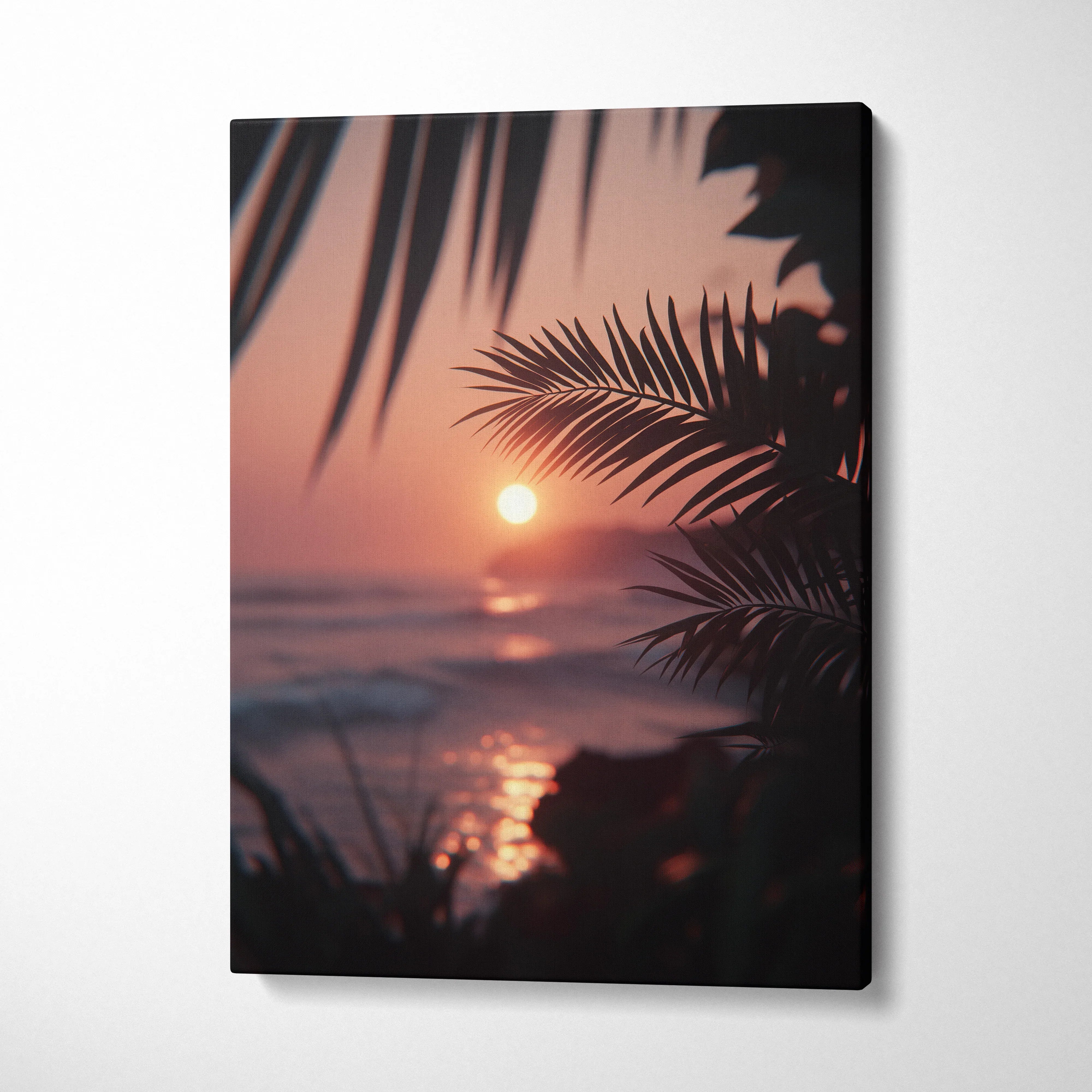 Vertical canvas wall art featuring a tropical sunset with palm leaves silhouetted over ocean waves, warm pink and orange.