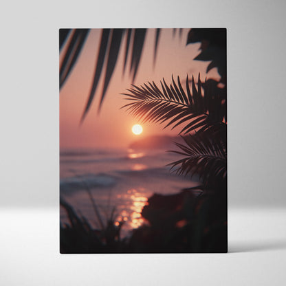 Vertical canvas wall art featuring a digital tropical sunset with palm leaves over ocean waves in warm pink and orange tones.