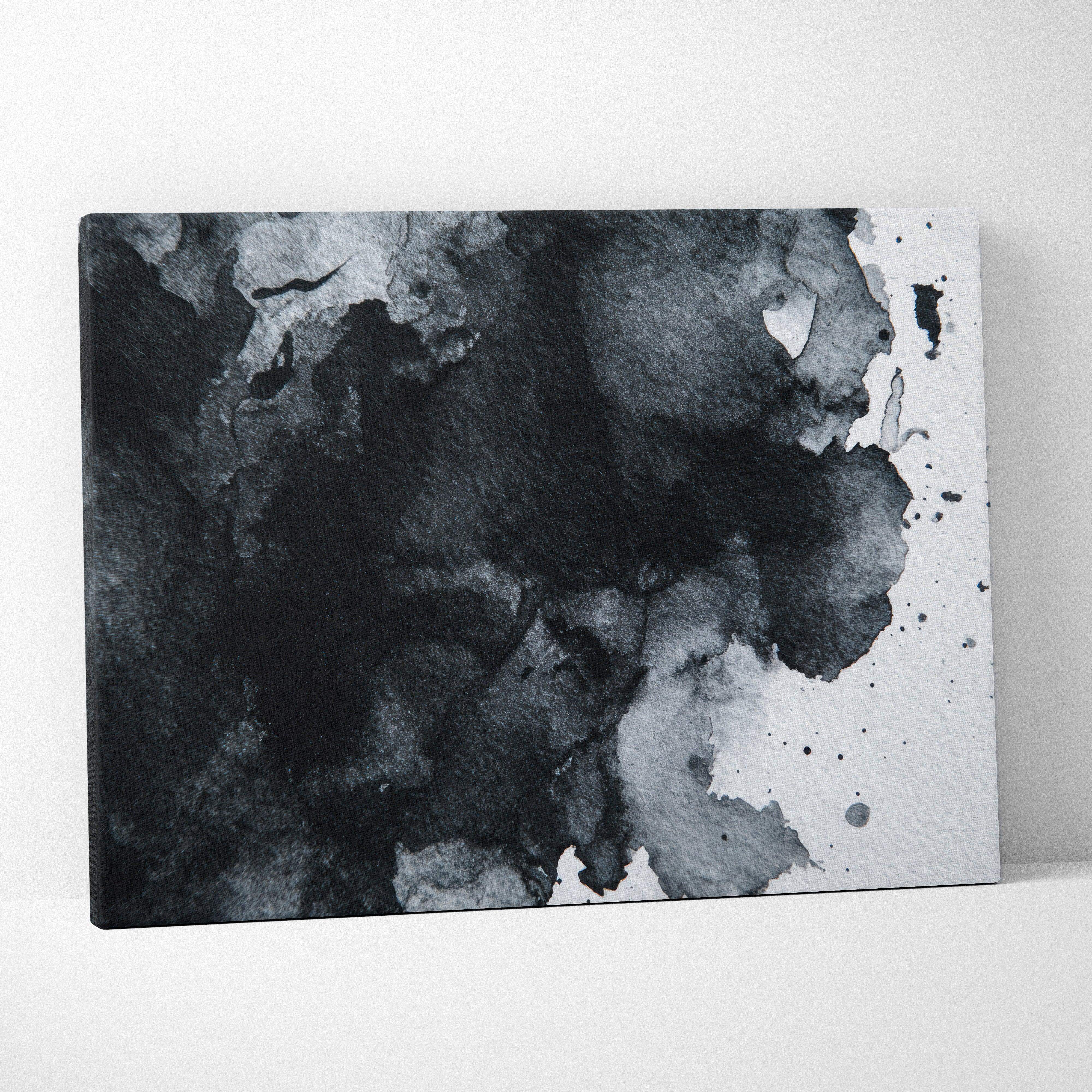 Black and white abstract ink wash canvas print with textured splattered patterns for contemporary living room decor
