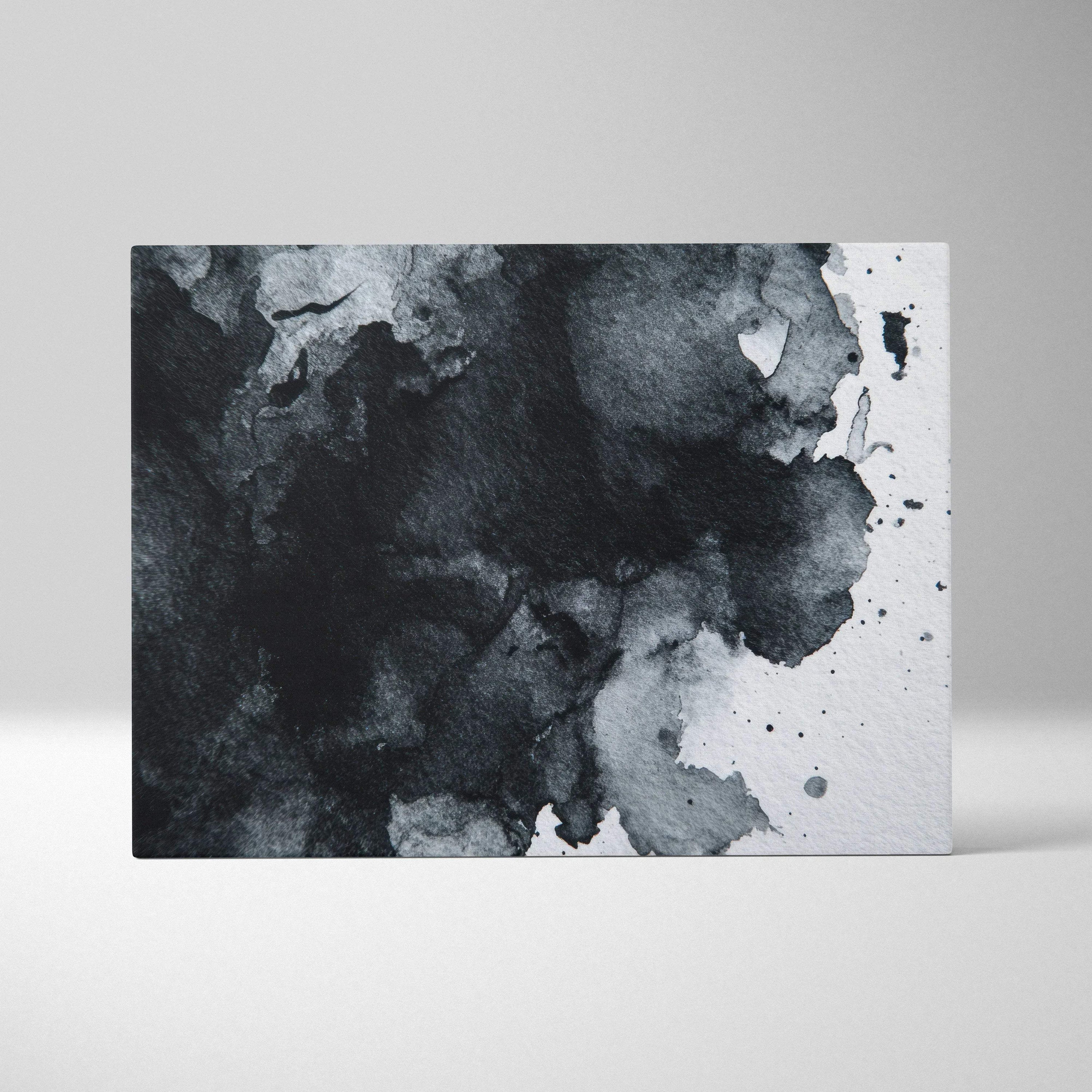 Black and gray abstract watercolor design on rectangular canvas wall art.