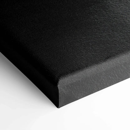 Black canvas art print with textured surface and wrapped edges for wall decor.