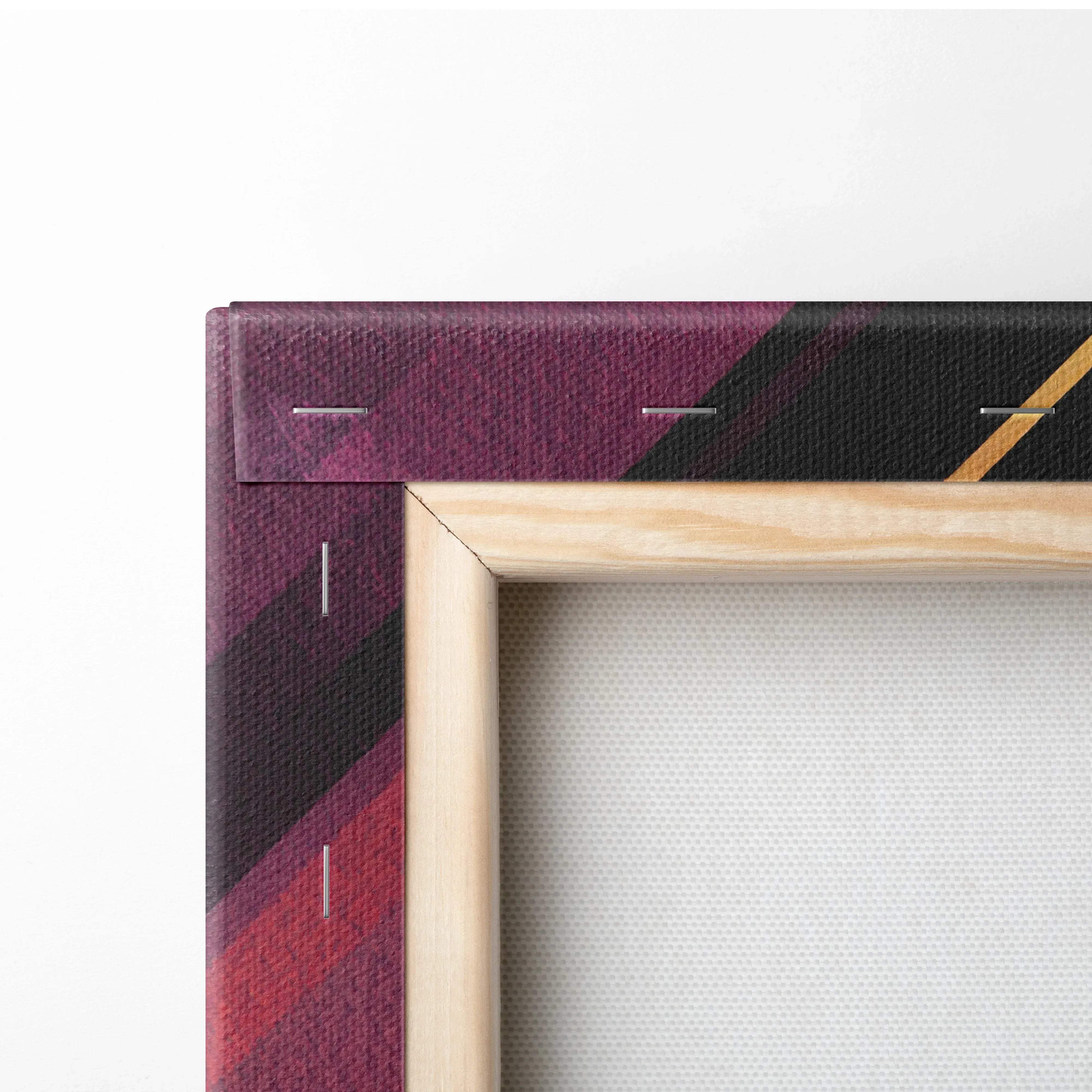 A wooden-framed canvas wall art with a bold diagonal pattern of deep purple black and gold vibrant colors